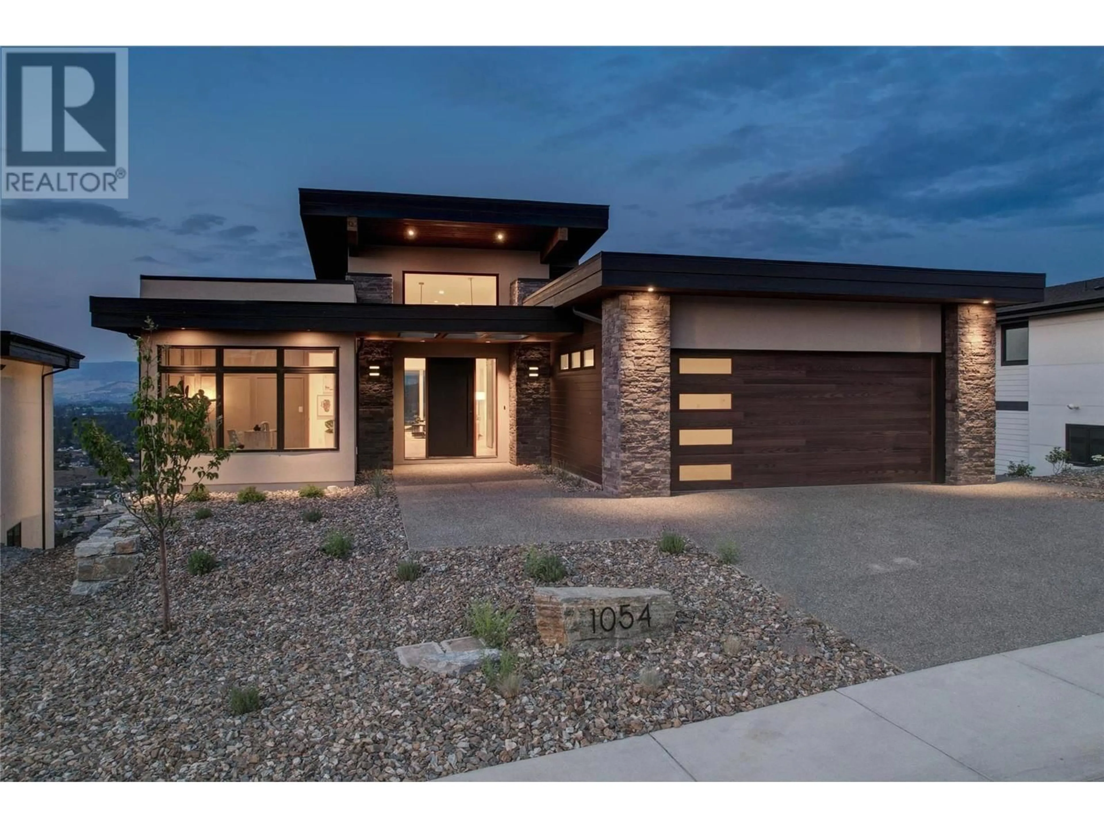 Home with brick exterior material, street for 1054 EMSLIE STREET, Kelowna British Columbia V1W5J1