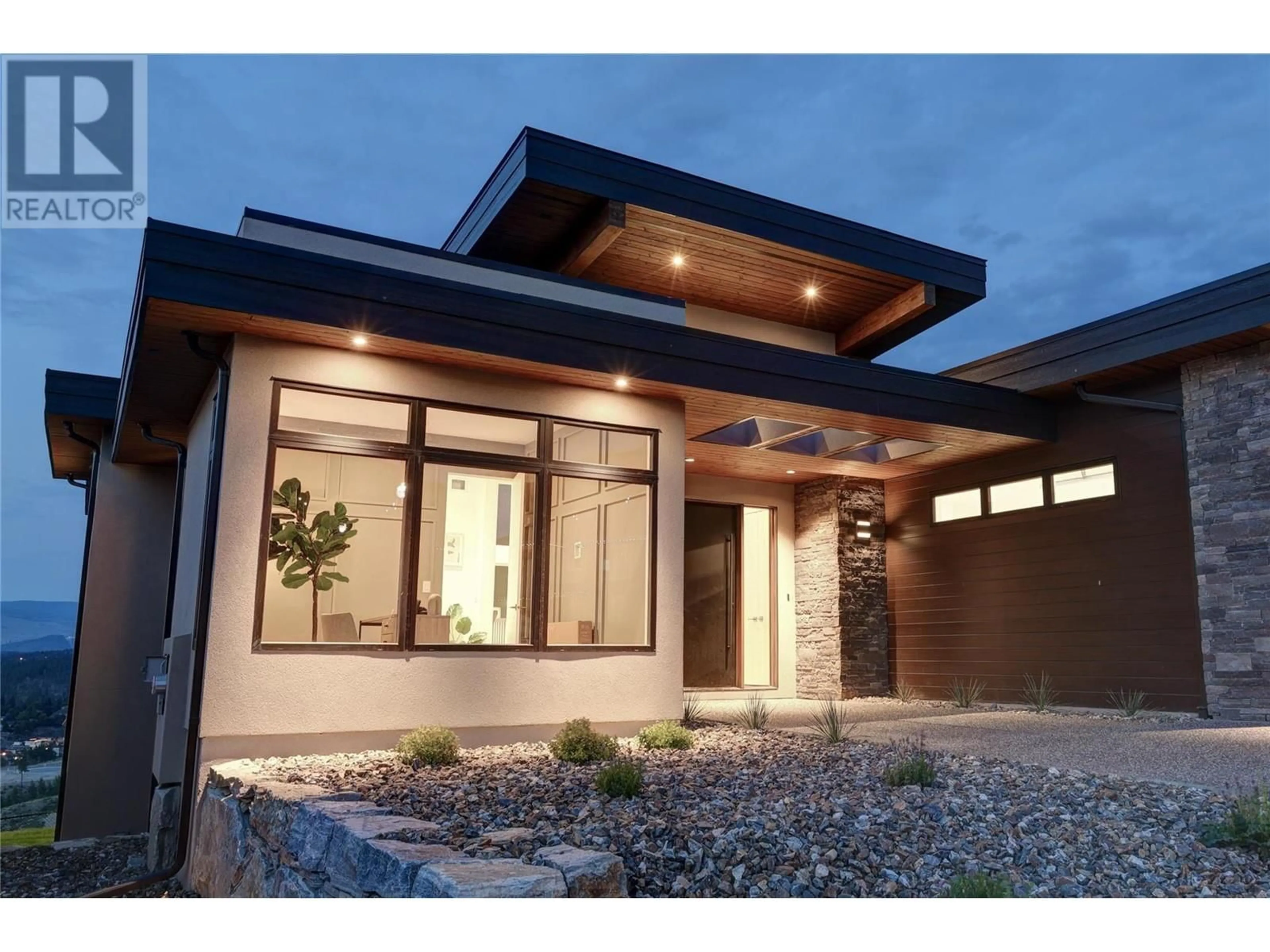 Home with brick exterior material, street for 1054 EMSLIE STREET, Kelowna British Columbia V1W5J1