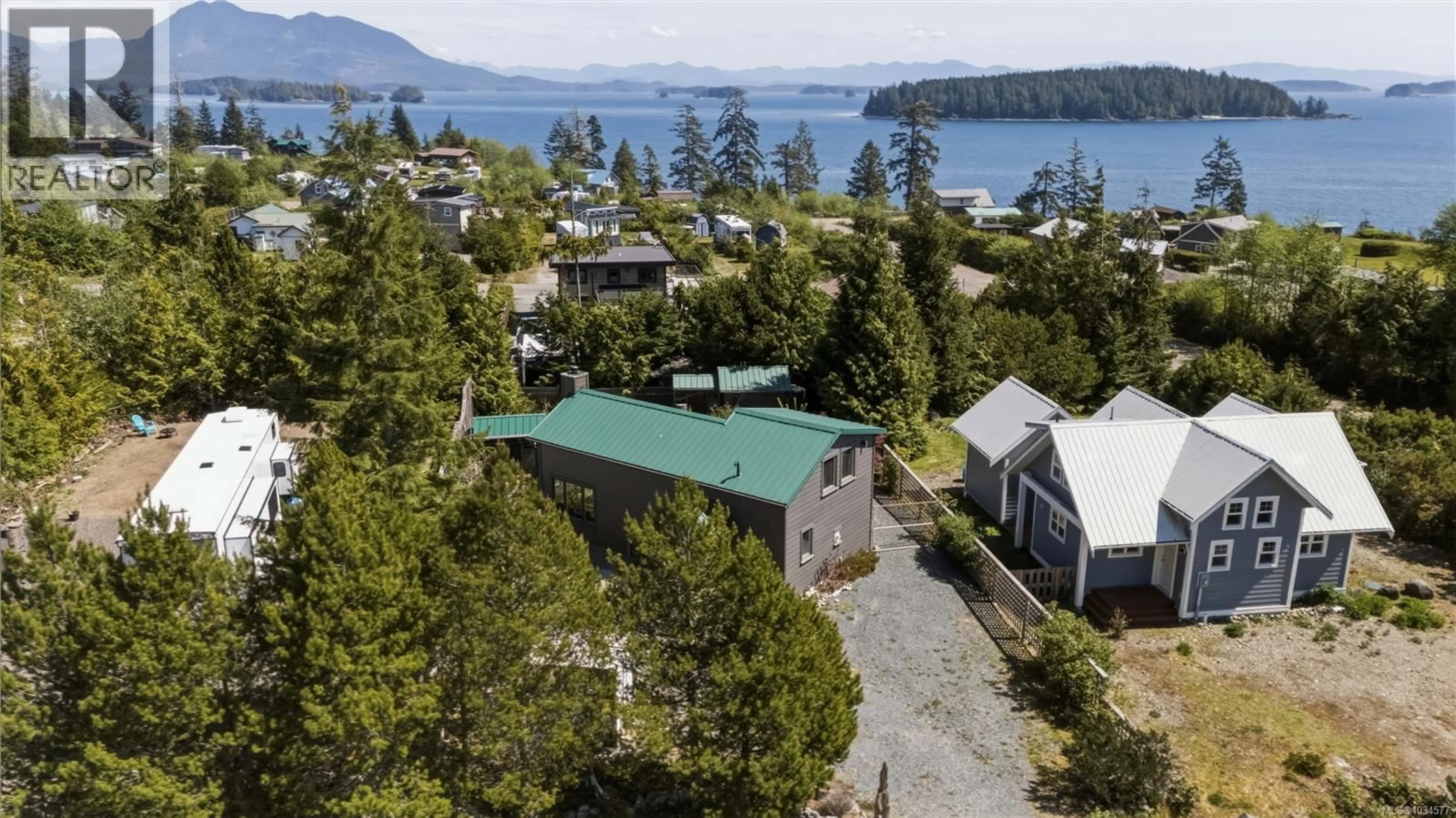 A pic from outside/outdoor area/front of a property/back of a property/a pic from drone, water/lake/river/ocean view for 1118 SIXTH AVENUE, Ucluelet British Columbia V0R3A0