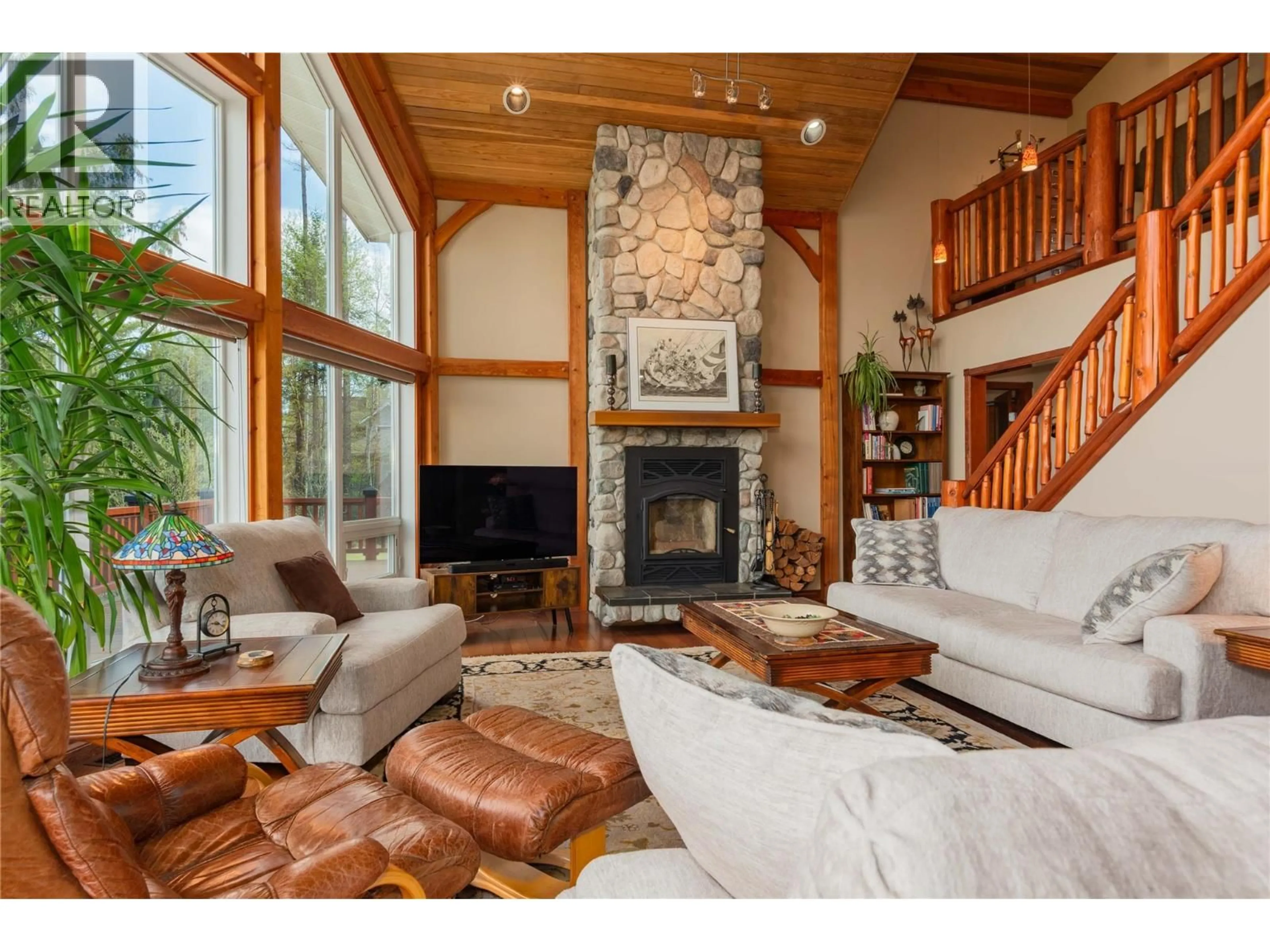 Living room with furniture, wood/laminate floor for 4830 FLETCHER CREEK ROAD, Fletcher Creek British Columbia V0G1M0