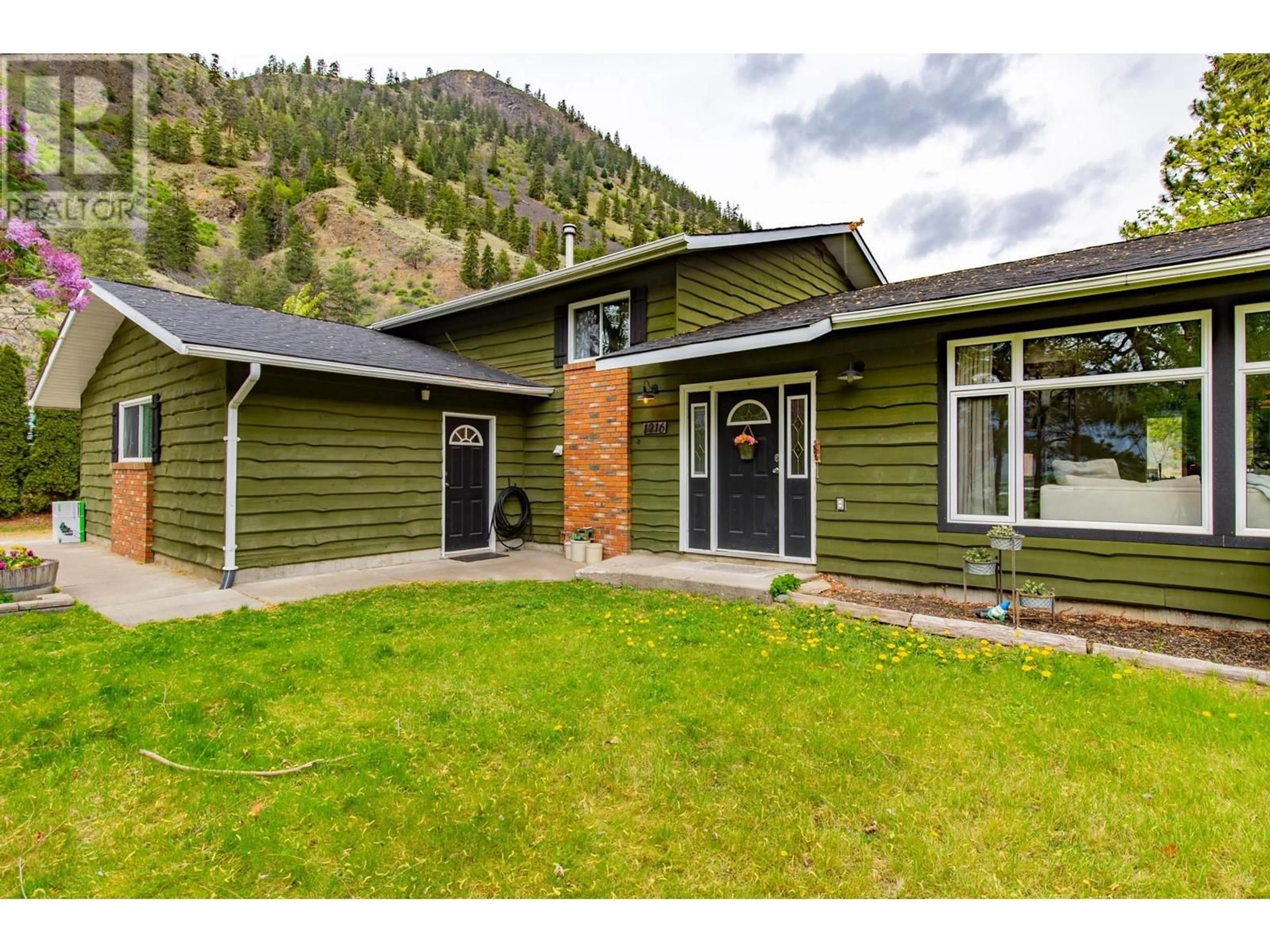 Home with vinyl exterior material, mountain view for 1216 HWY 3A OTHER, Keremeos British Columbia V0X1N4