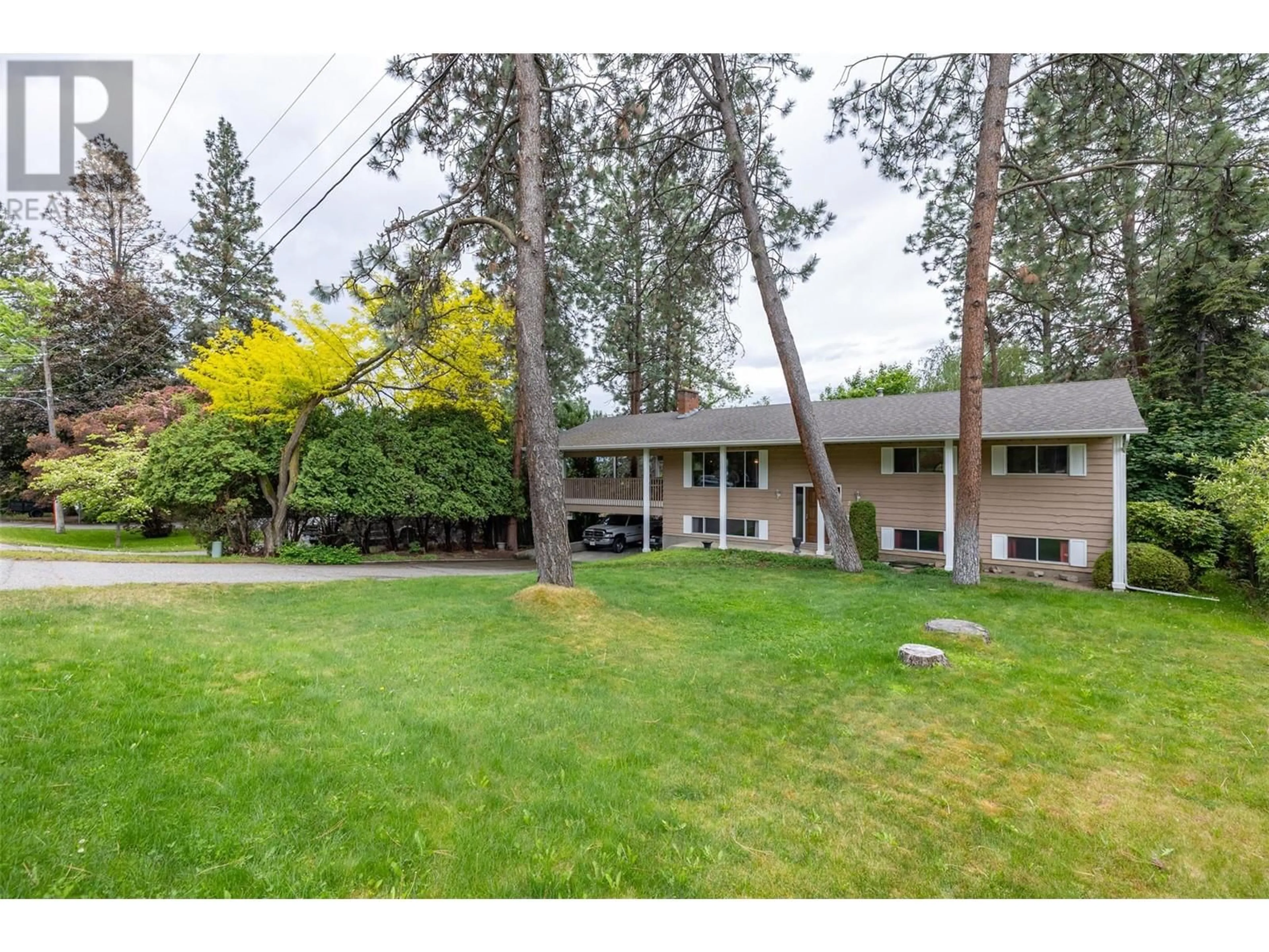 A pic from outside/outdoor area/front of a property/back of a property/a pic from drone, unknown for 7 BELLO ROAD, Kelowna British Columbia V1V1B9