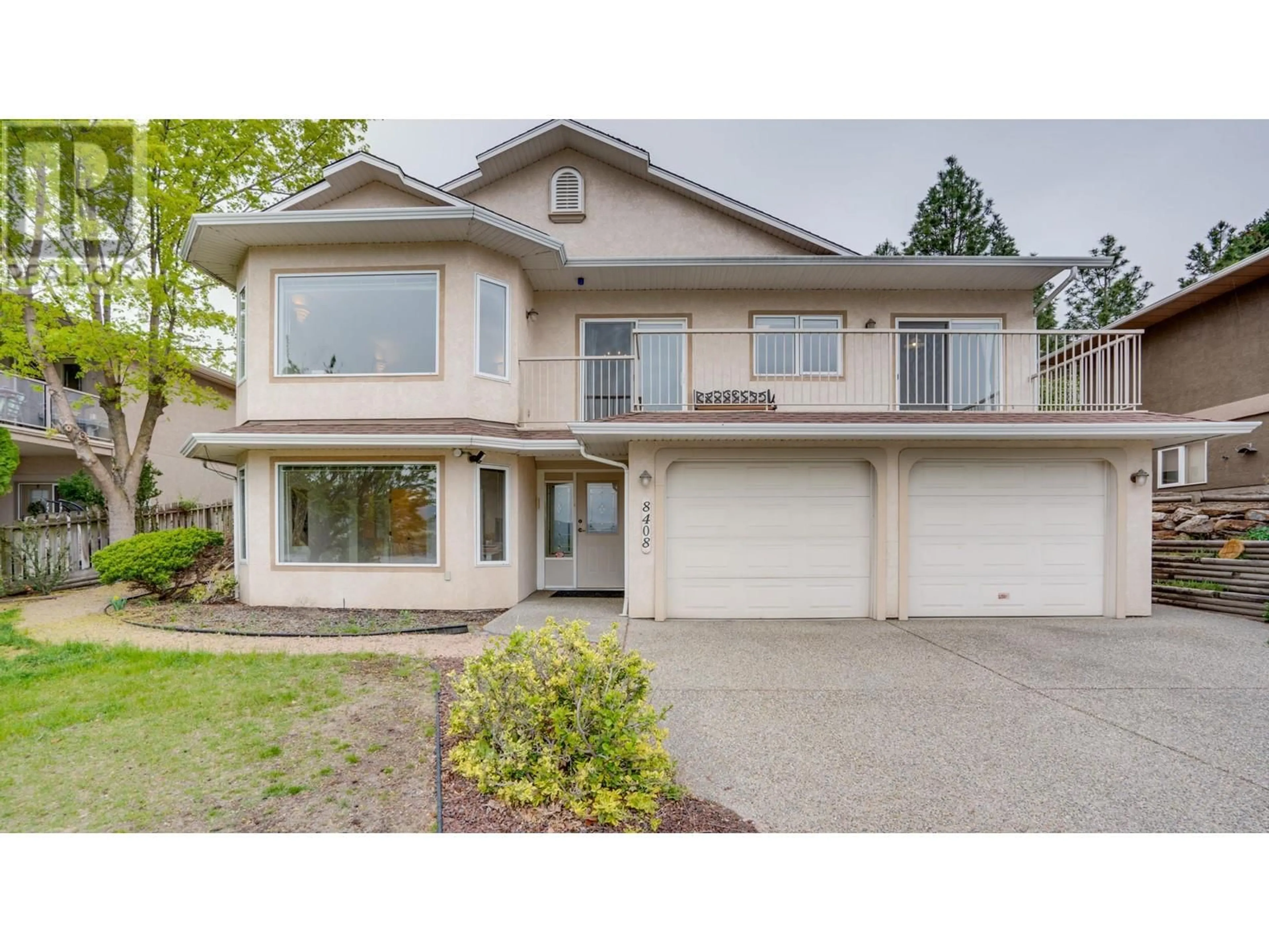 Home with vinyl exterior material, street for 8408 STONERIDGE DRIVE, Coldstream British Columbia V1B3M3