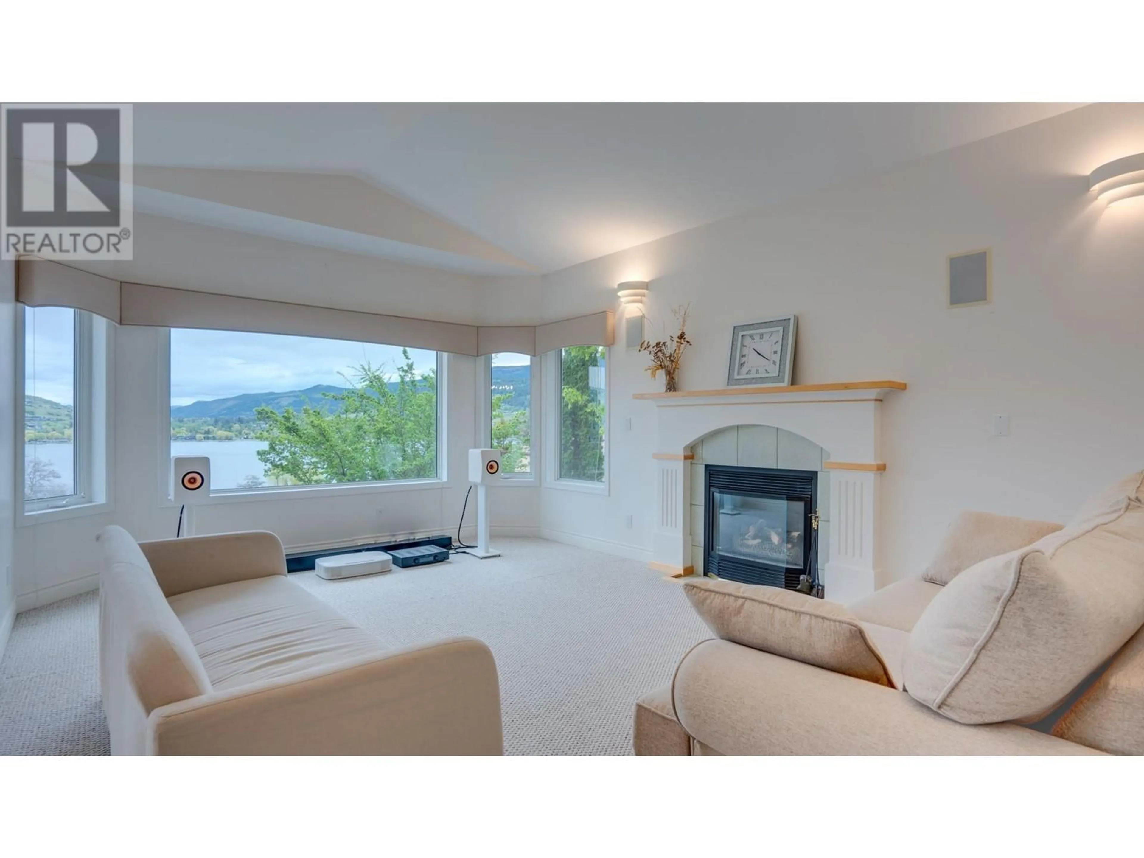 Living room with furniture, unknown for 8408 STONERIDGE DRIVE, Coldstream British Columbia V1B3M3