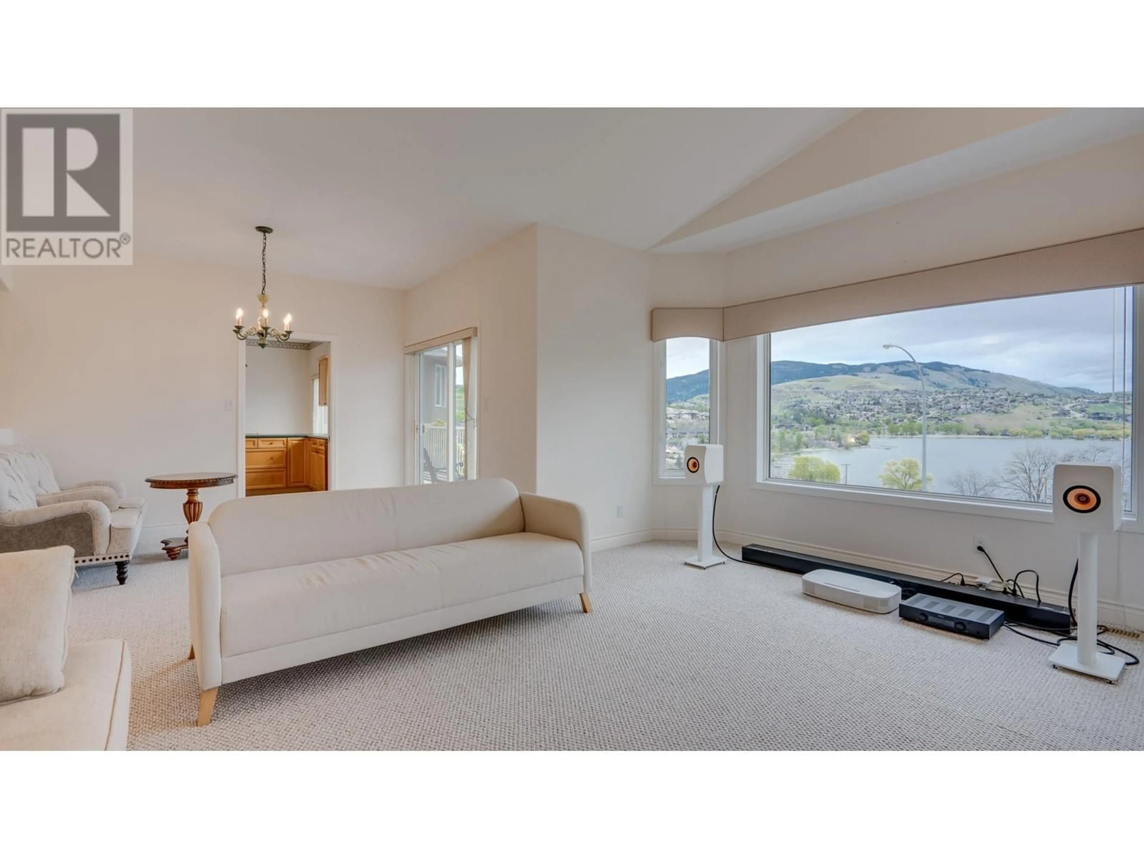 Living room with furniture, unknown for 8408 STONERIDGE DRIVE, Coldstream British Columbia V1B3M3