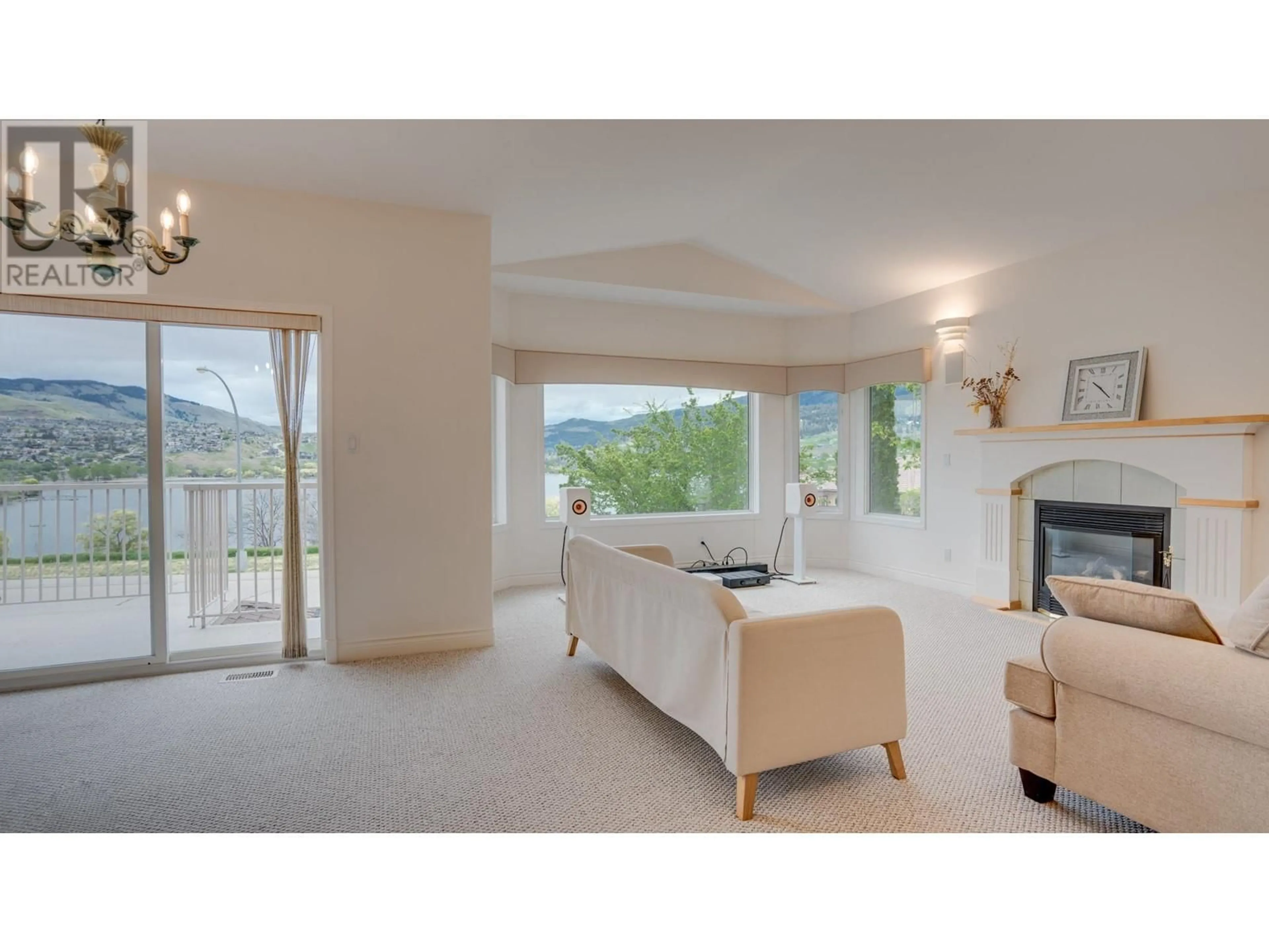 Living room with furniture, unknown for 8408 STONERIDGE DRIVE, Coldstream British Columbia V1B3M3
