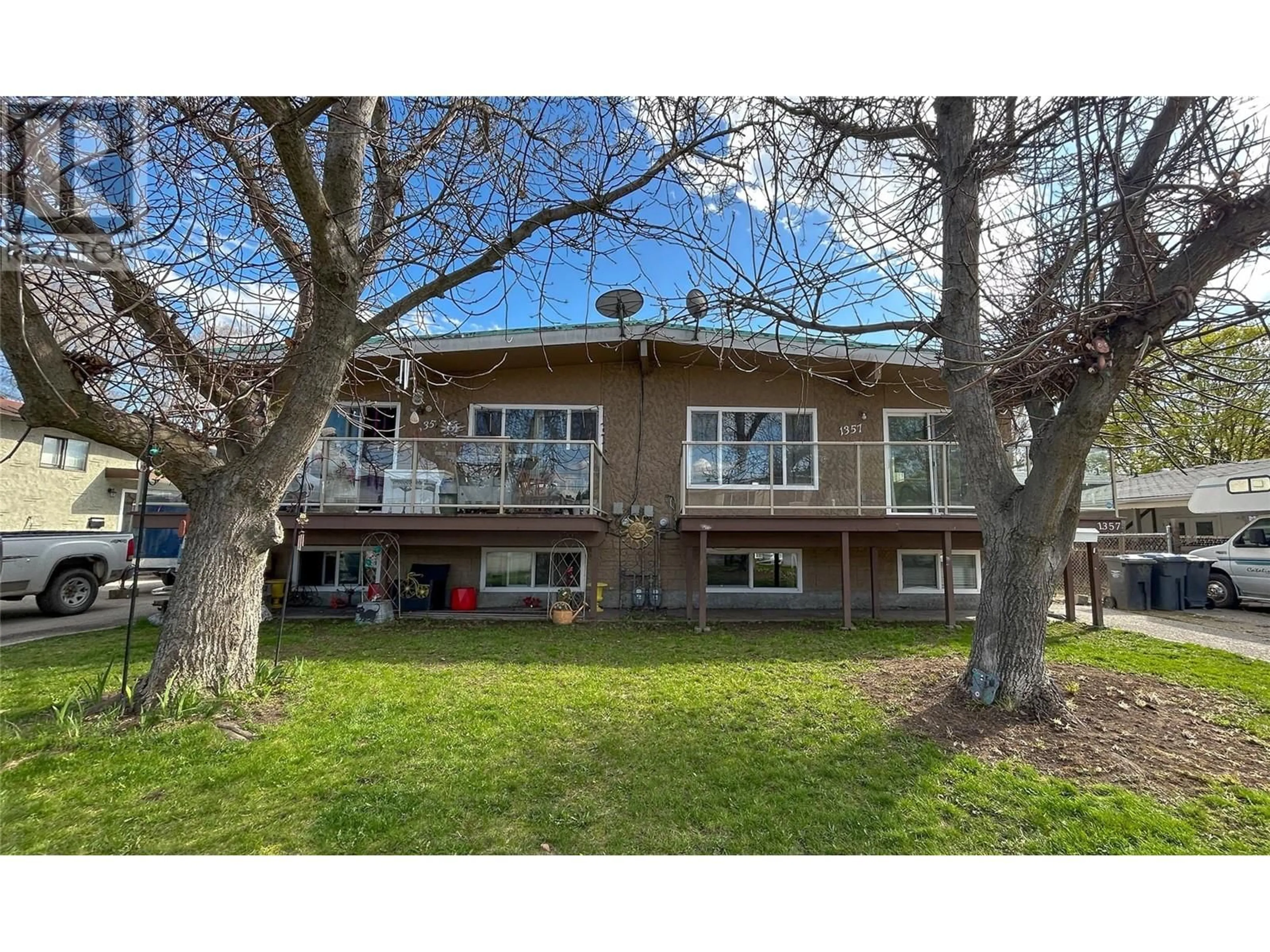 A pic from outside/outdoor area/front of a property/back of a property/a pic from drone, unknown for 1355/1357 SYLVANIA CRESCENT, Kelowna British Columbia V1X5J4