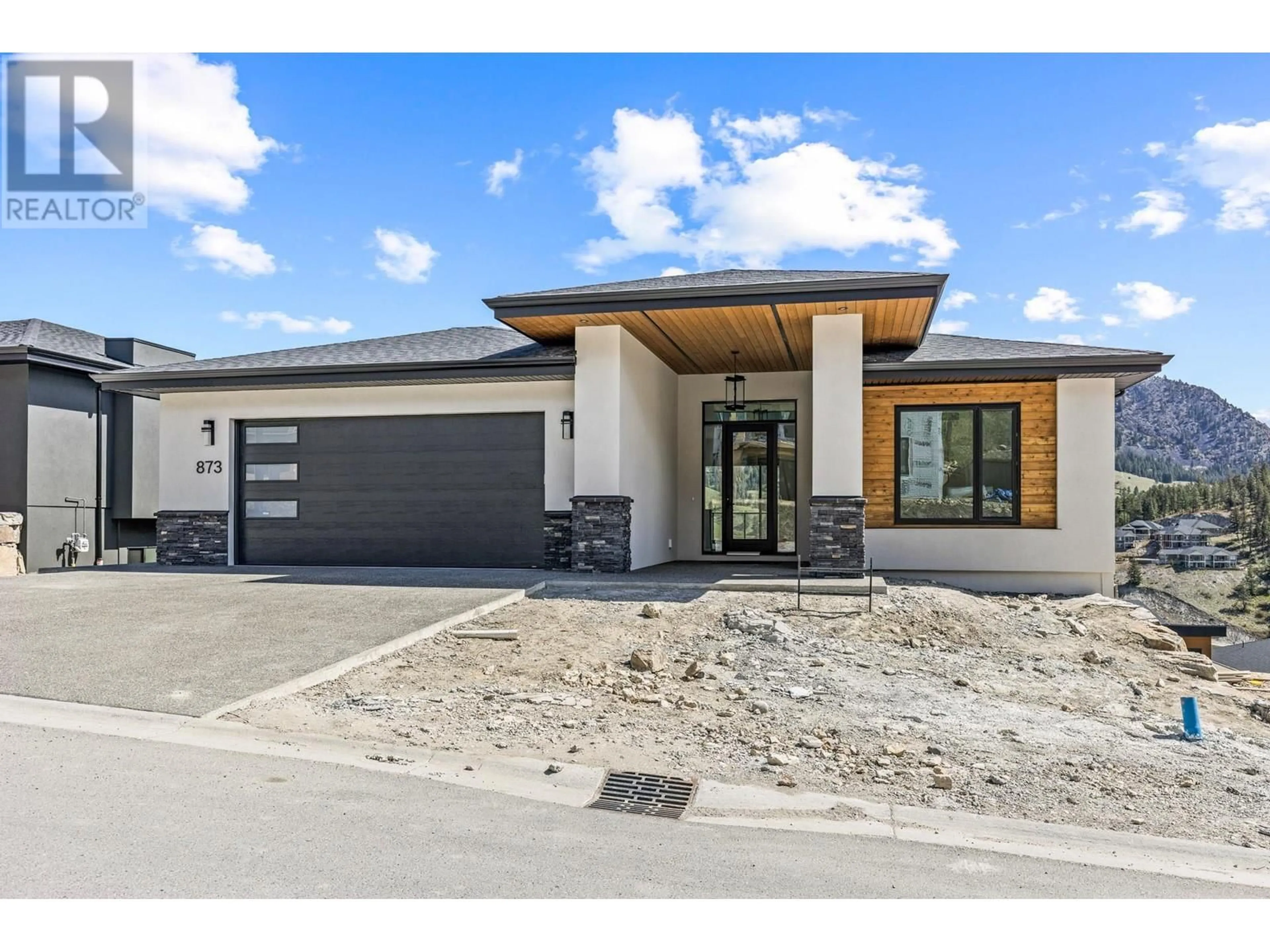 Home with brick exterior material, street for 873 MELROSE STREET, Kelowna British Columbia V1P0A8