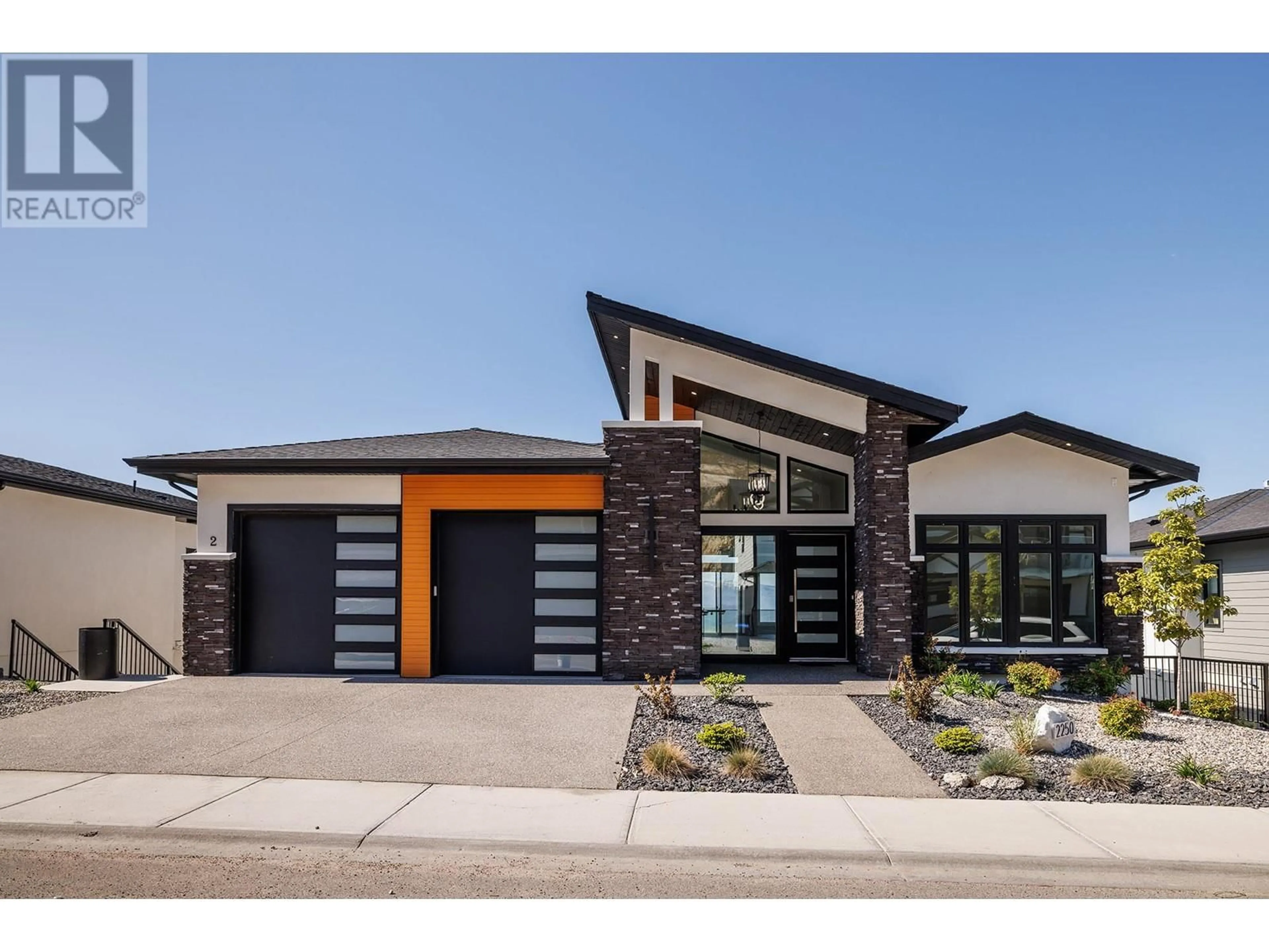 Home with brick exterior material, street for 2250 LAVETTA DRIVE, Kelowna British Columbia V1P1V1