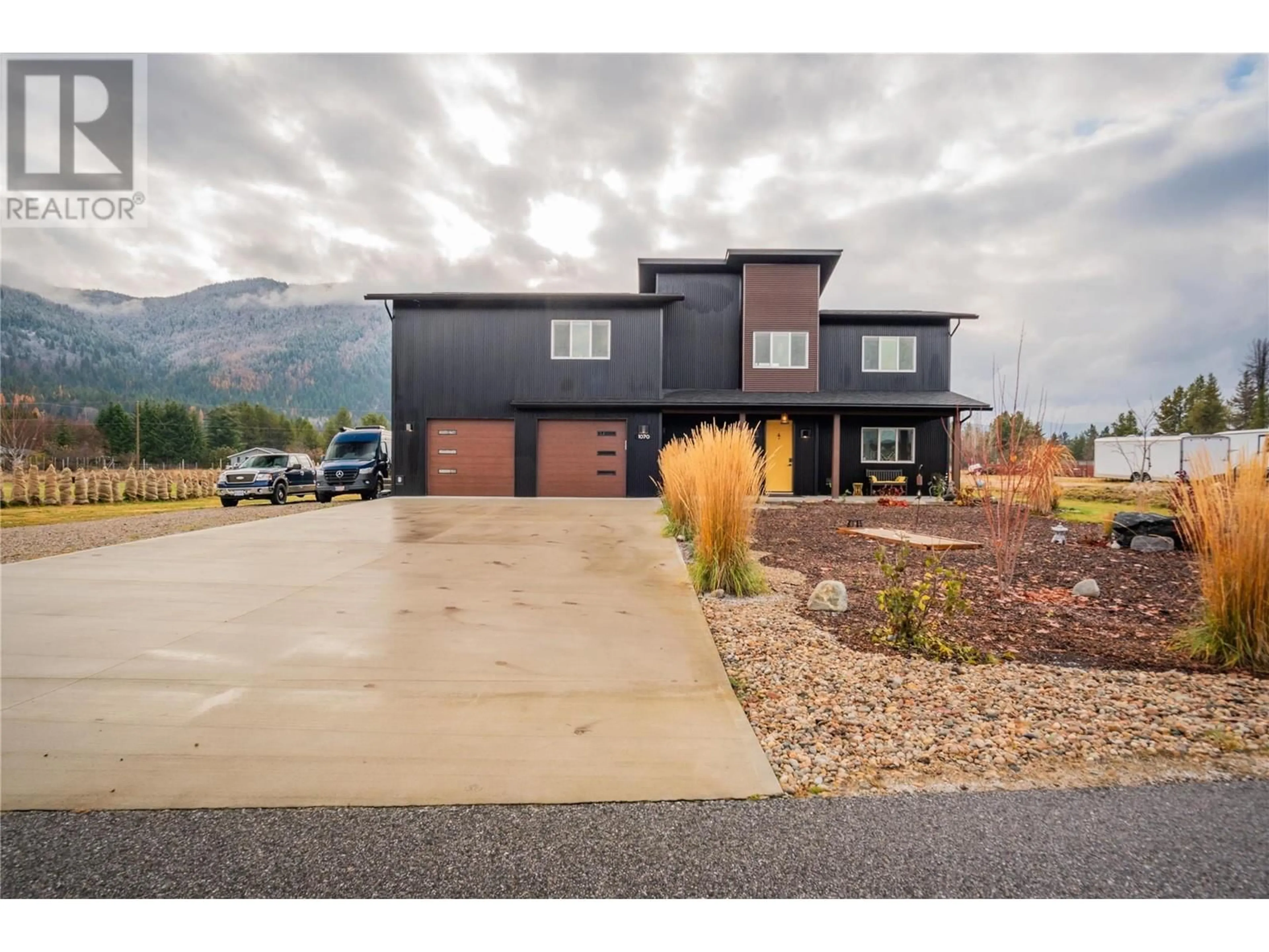 Home with brick exterior material, mountain view for 1070 ELKVIEW ROAD, Castlegar British Columbia V1N4L5