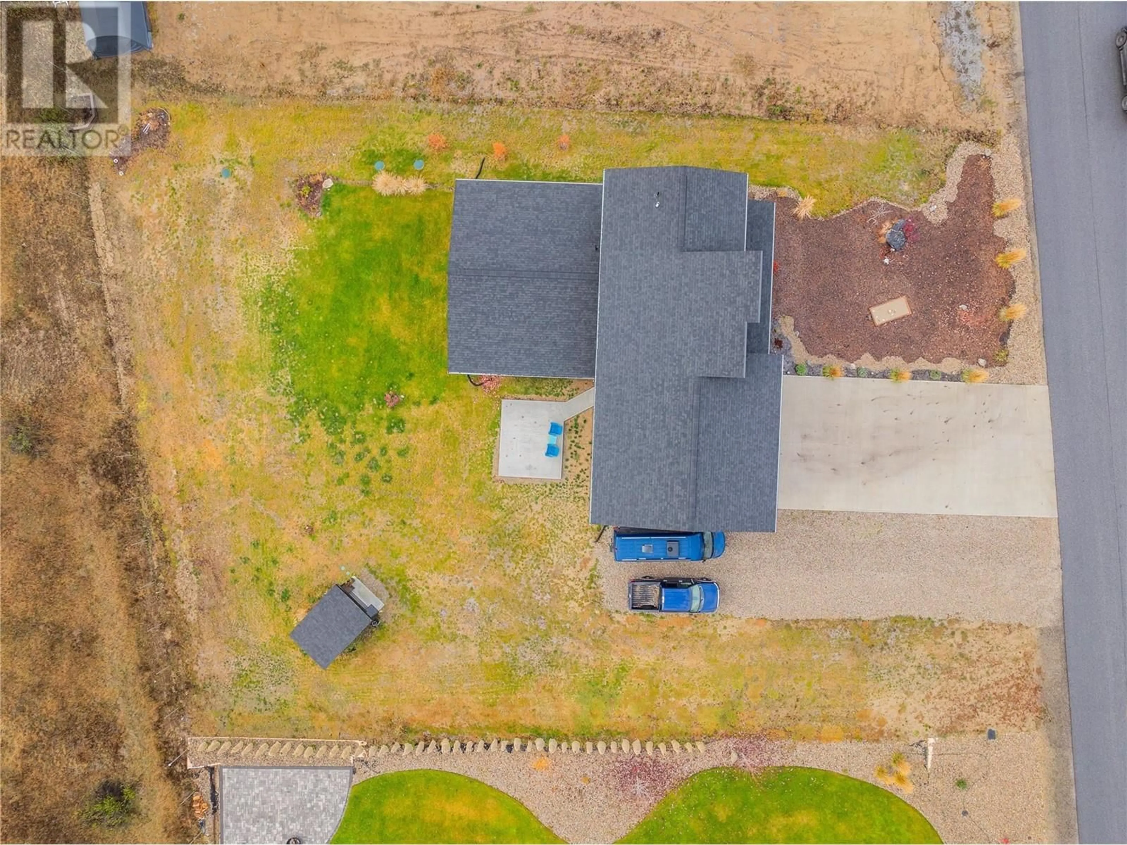 A pic from outside/outdoor area/front of a property/back of a property/a pic from drone, street for 1070 ELKVIEW ROAD, Castlegar British Columbia V1N4L5