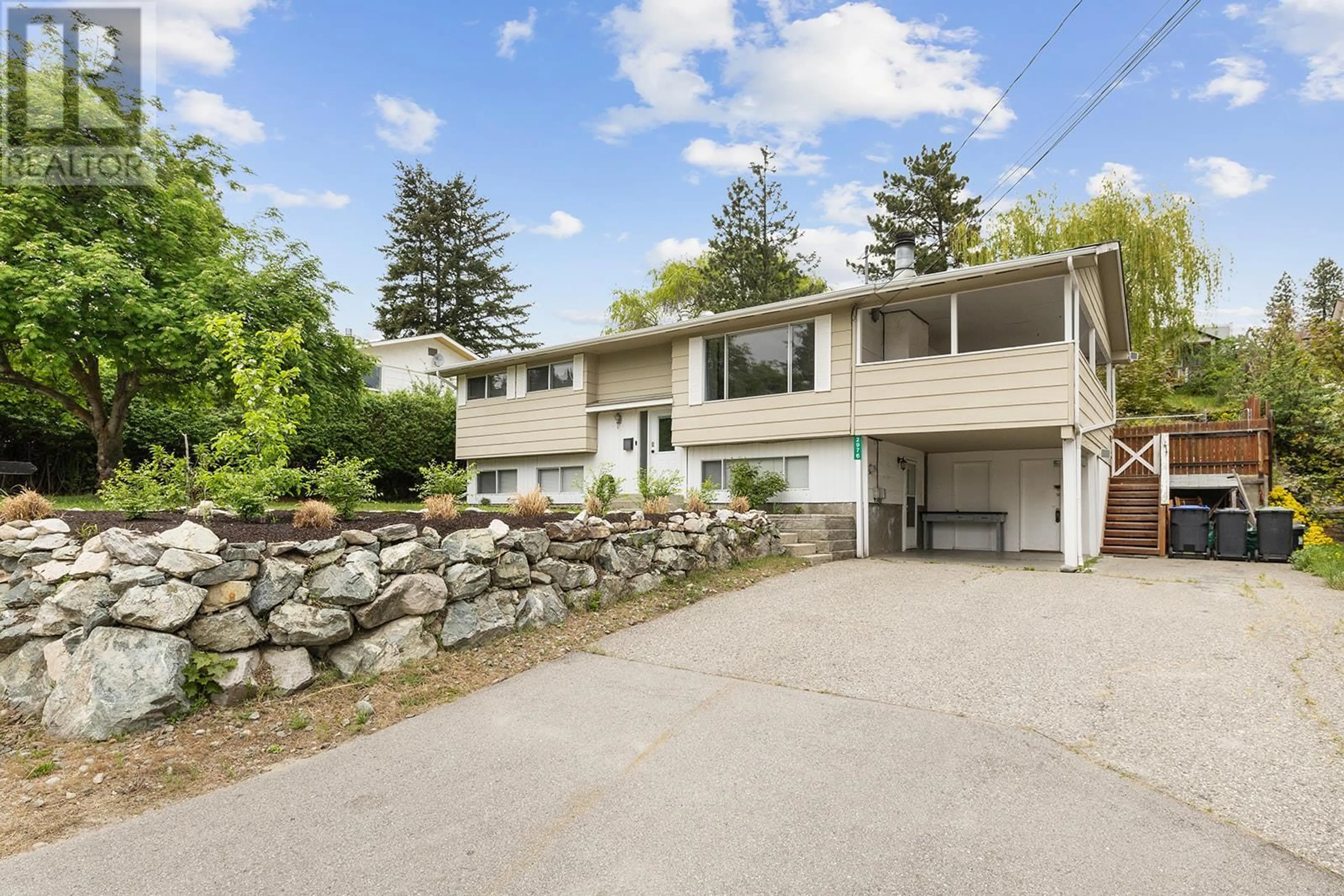 A pic from outside/outdoor area/front of a property/back of a property/a pic from drone, street for 2976 MCALLISTER ROAD, West Kelowna British Columbia V4T1G7