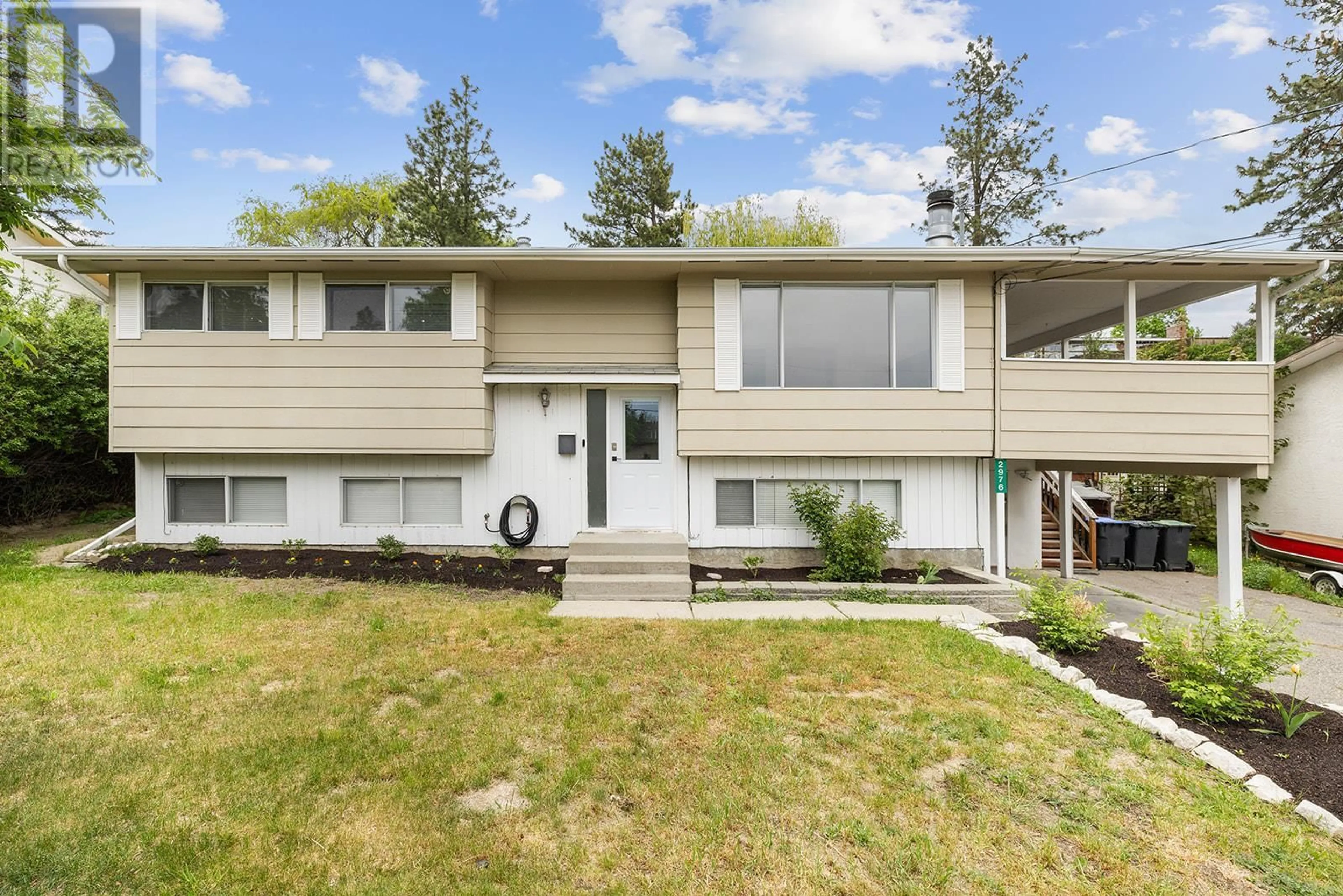 Home with vinyl exterior material, street for 2976 MCALLISTER ROAD, West Kelowna British Columbia V4T1G7