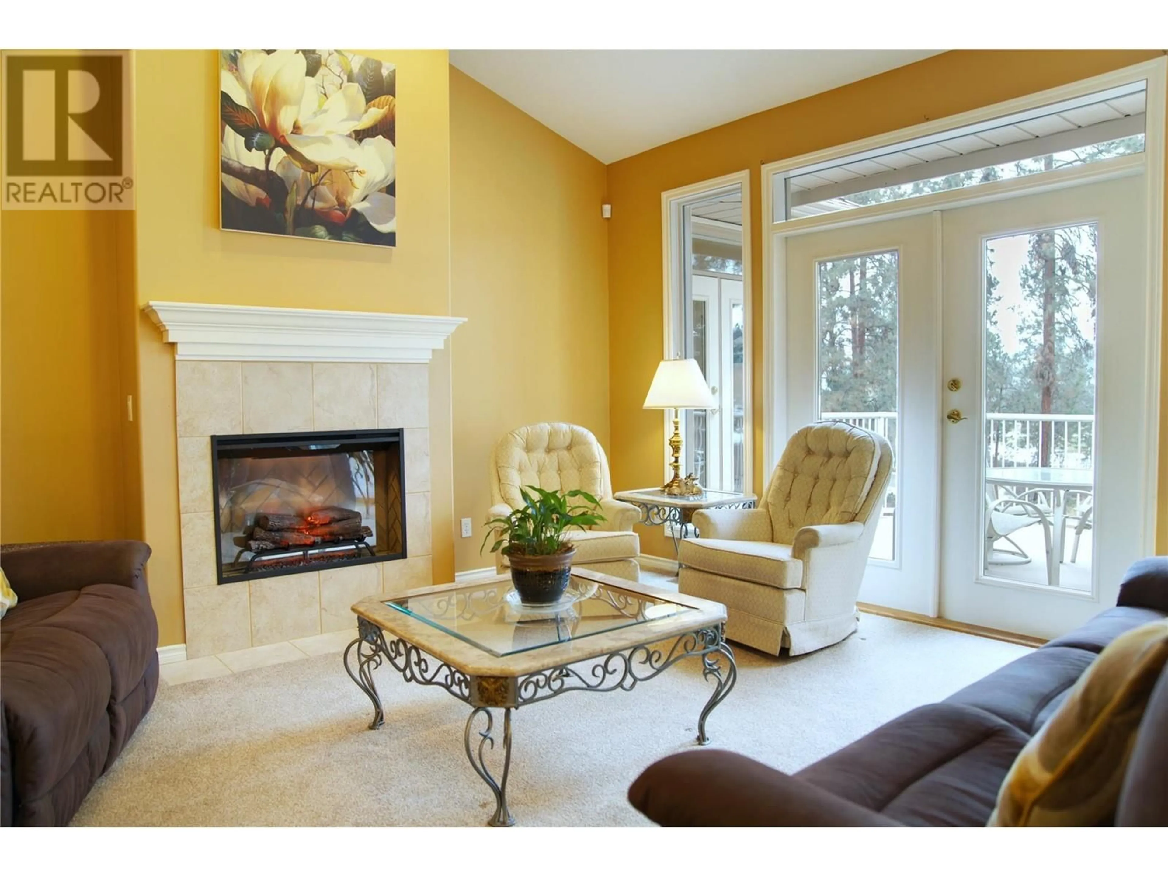 Living room with furniture, unknown for 3905 GALLAGHERS CIRCLE, Kelowna British Columbia V1W3Z9