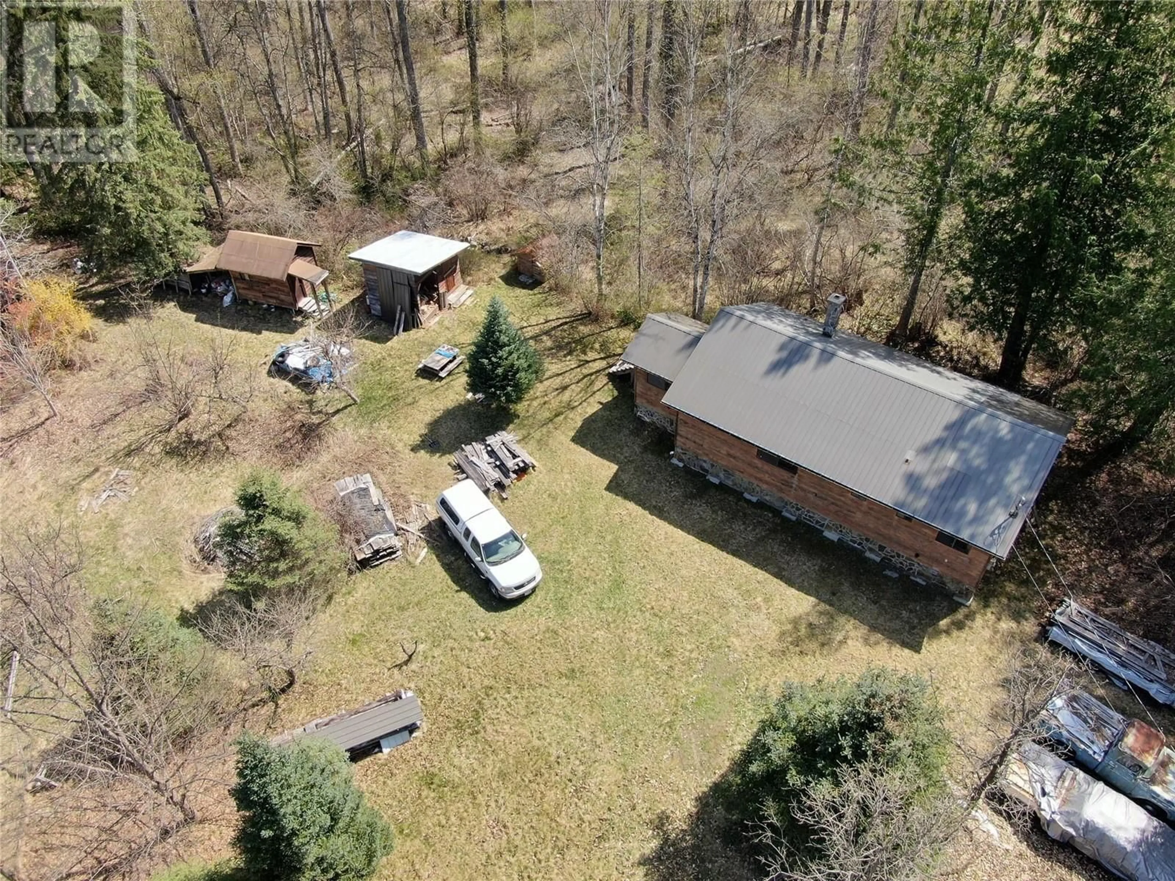 A pic from outside/outdoor area/front of a property/back of a property/a pic from drone, forest/trees view for 6268 PICARD ROAD, Appledale British Columbia V0G2J0