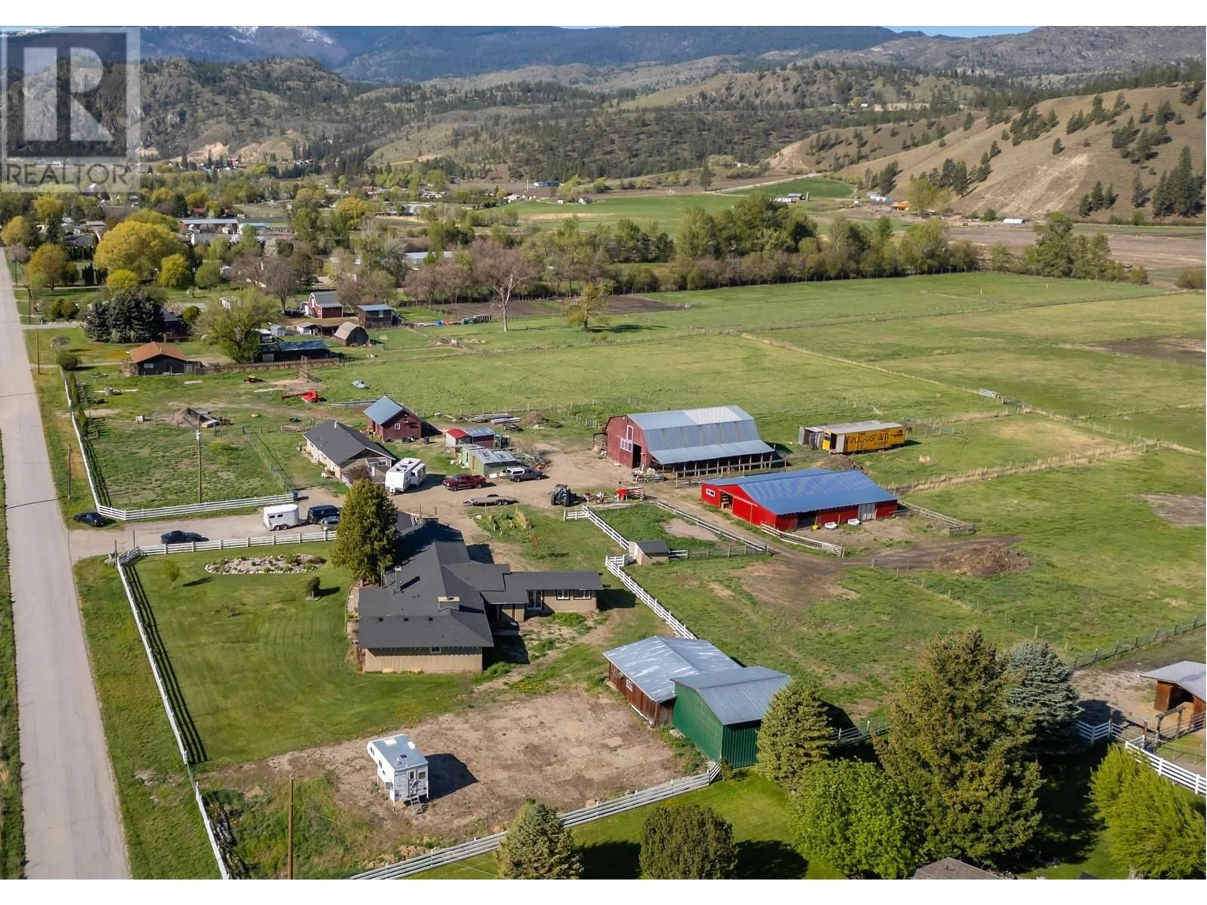 A pic from outside/outdoor area/front of a property/back of a property/a pic from drone, mountain view for 8134 RIVER ROAD, Oliver British Columbia V0H1T5