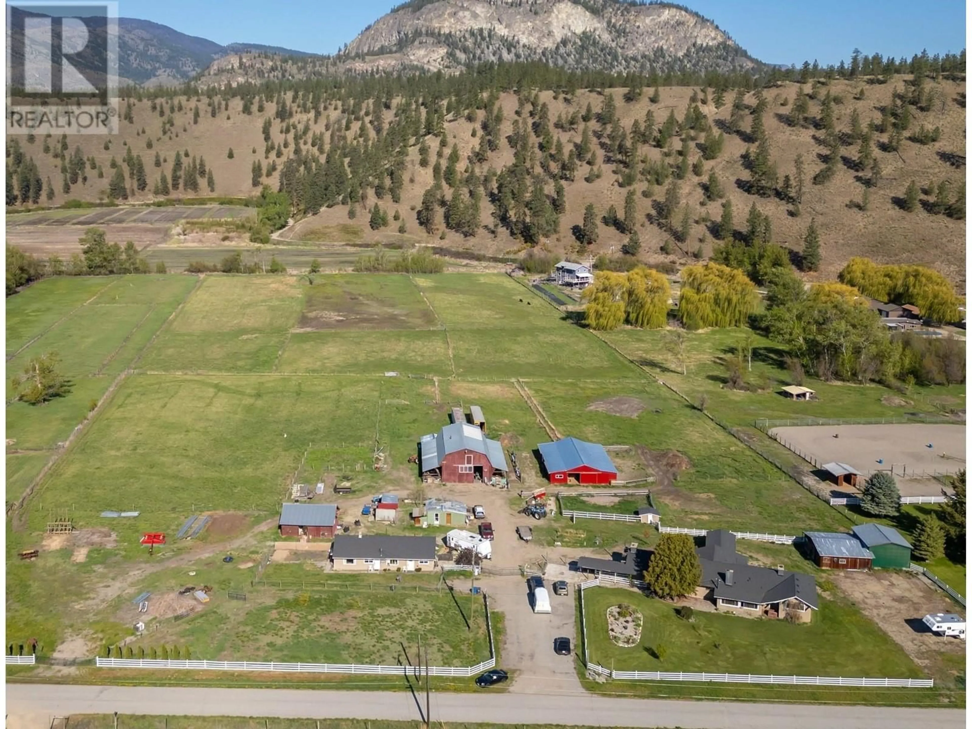 A pic from outside/outdoor area/front of a property/back of a property/a pic from drone, mountain view for 8134 RIVER ROAD, Oliver British Columbia V0H1T5