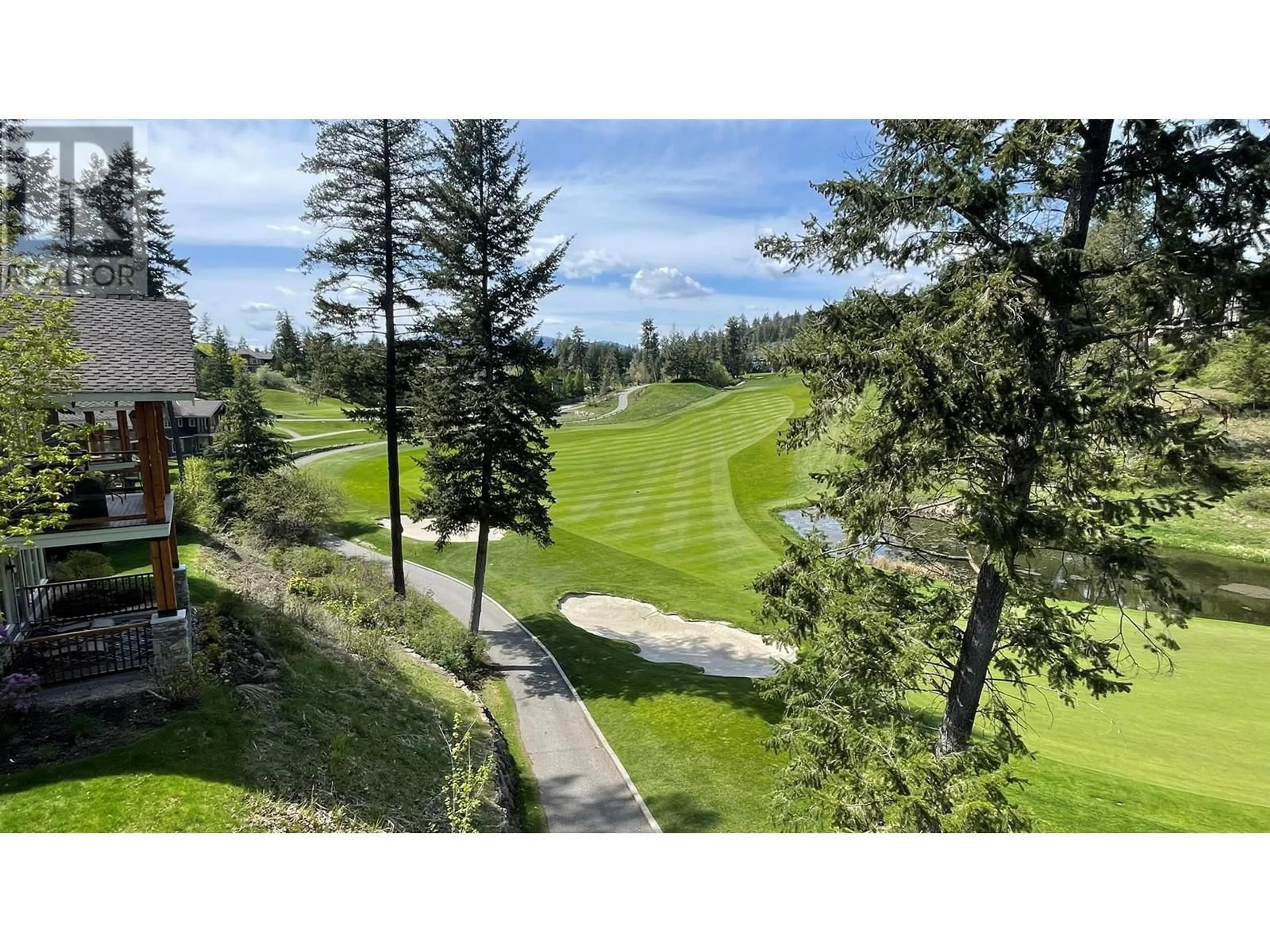 A pic from outside/outdoor area/front of a property/back of a property/a pic from drone, forest/trees view for 15 - 251 PREDATOR RIDGE DRIVE, Vernon British Columbia V1H1V2