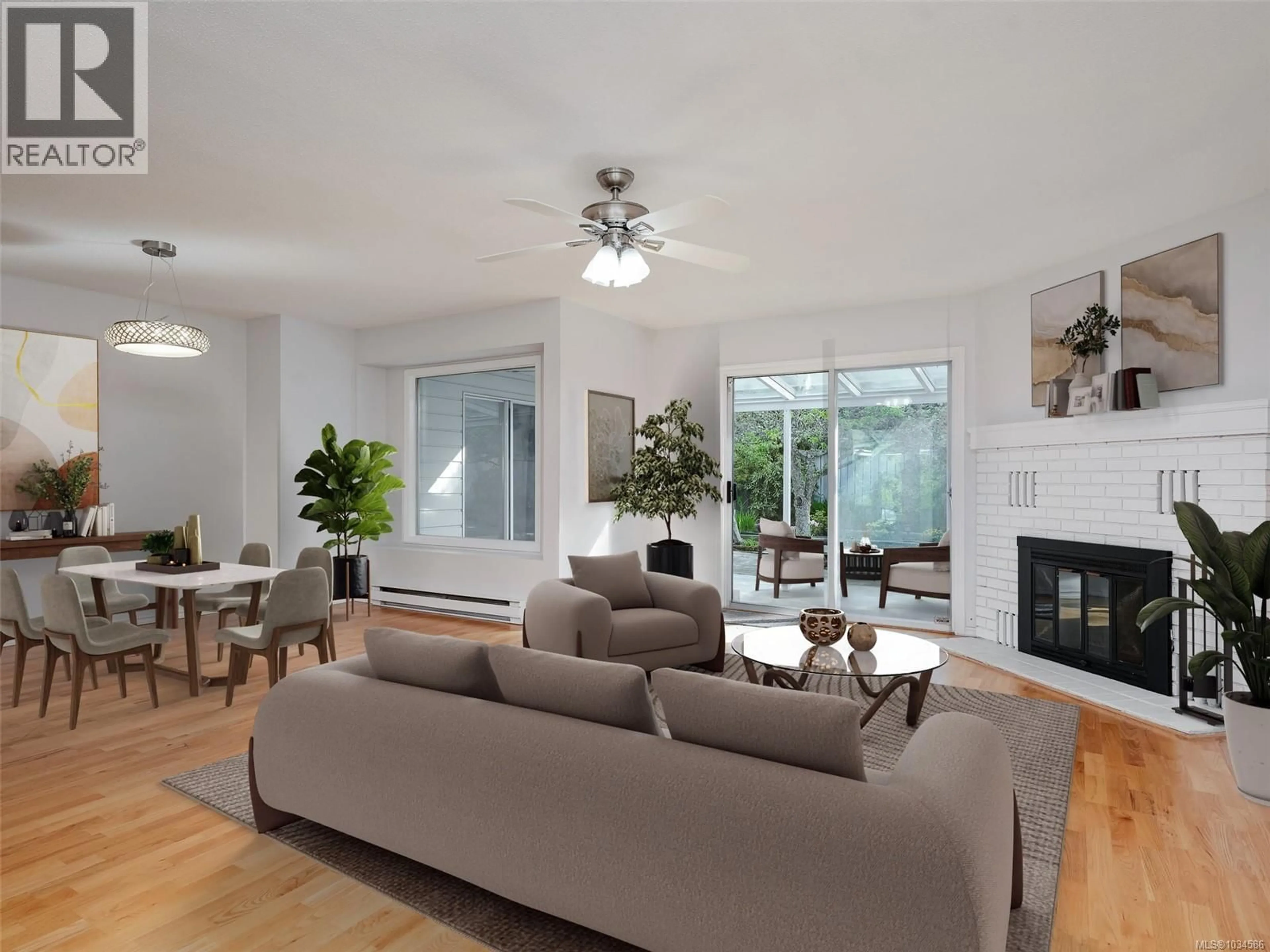 Living room with furniture, wood/laminate floor for 4163 SHELBOURNE STREET, Saanich British Columbia V8N3E8