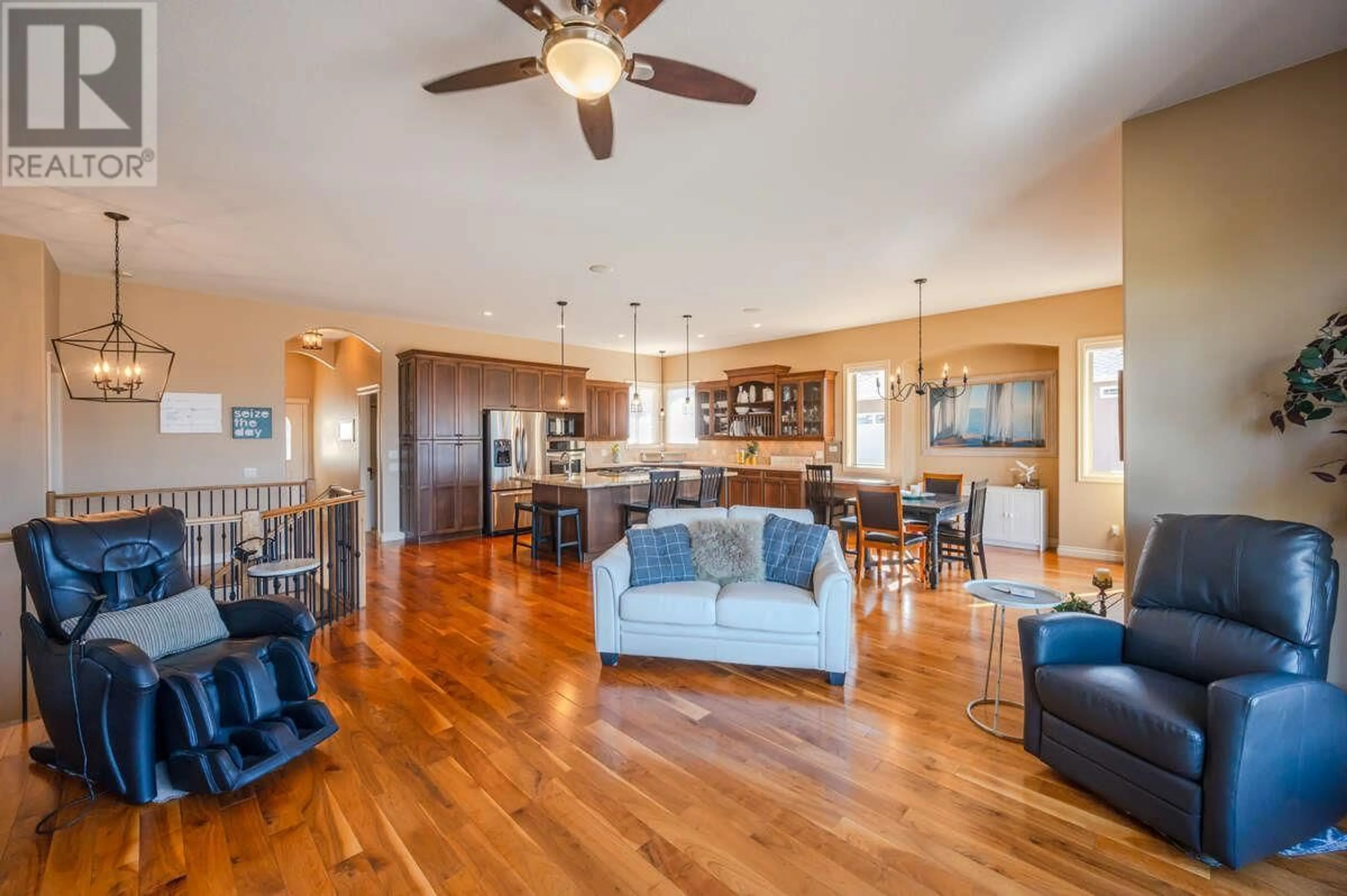 Living room with furniture, wood/laminate floor for 1564 HOLDEN ROAD, Penticton British Columbia V2A8M9