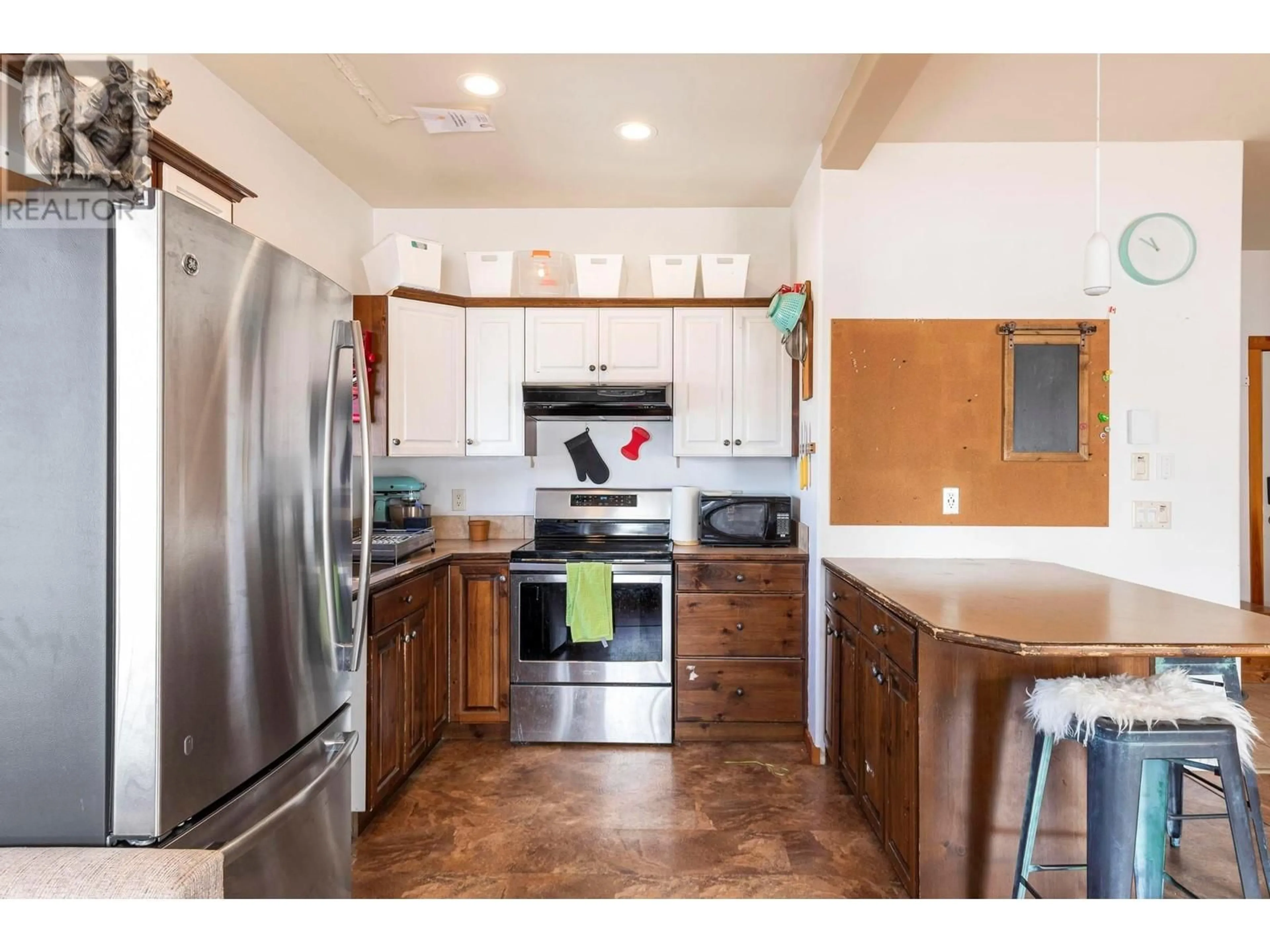 Open concept kitchen, ceramic/tile floor for 19 - 5015 SNOWBIRD WAY, Big White British Columbia V1P1T4