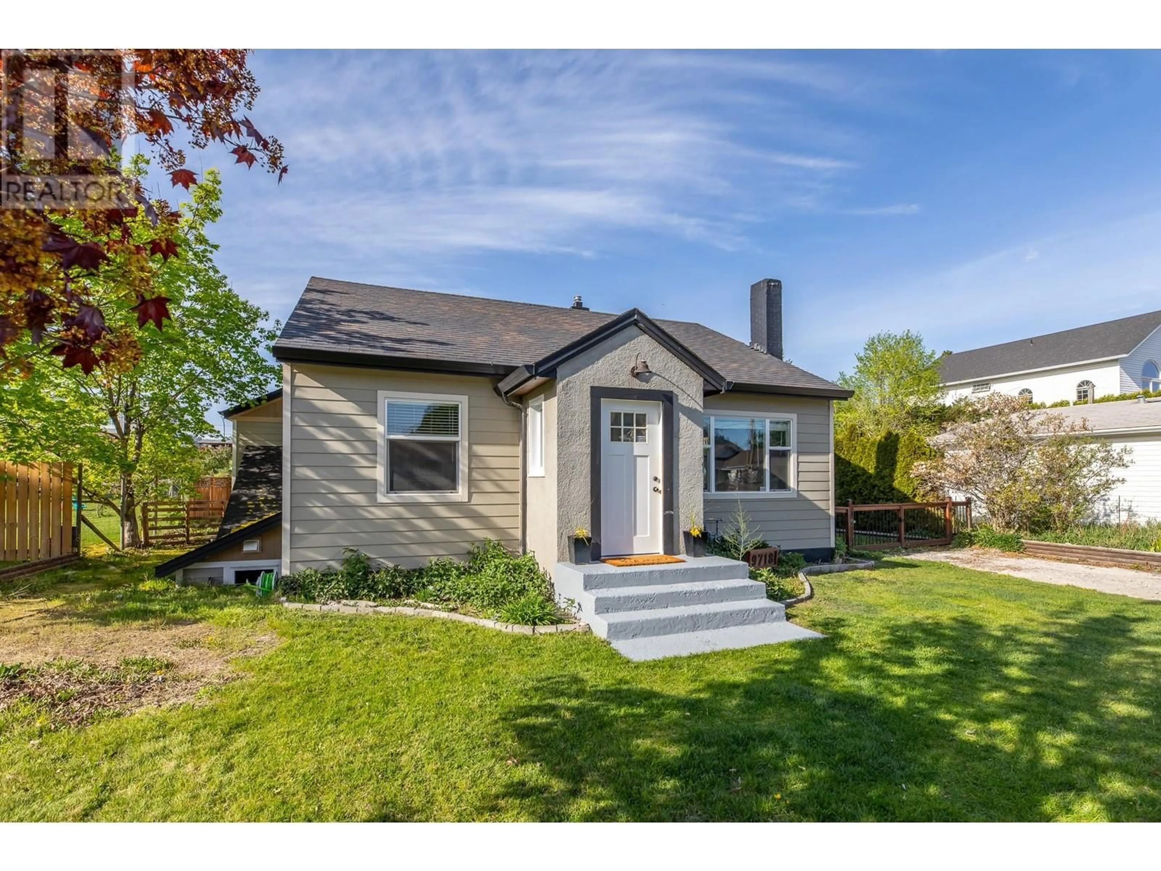 Home with vinyl exterior material, street for 9718 JULIA STREET, Summerland British Columbia V0H1Z6