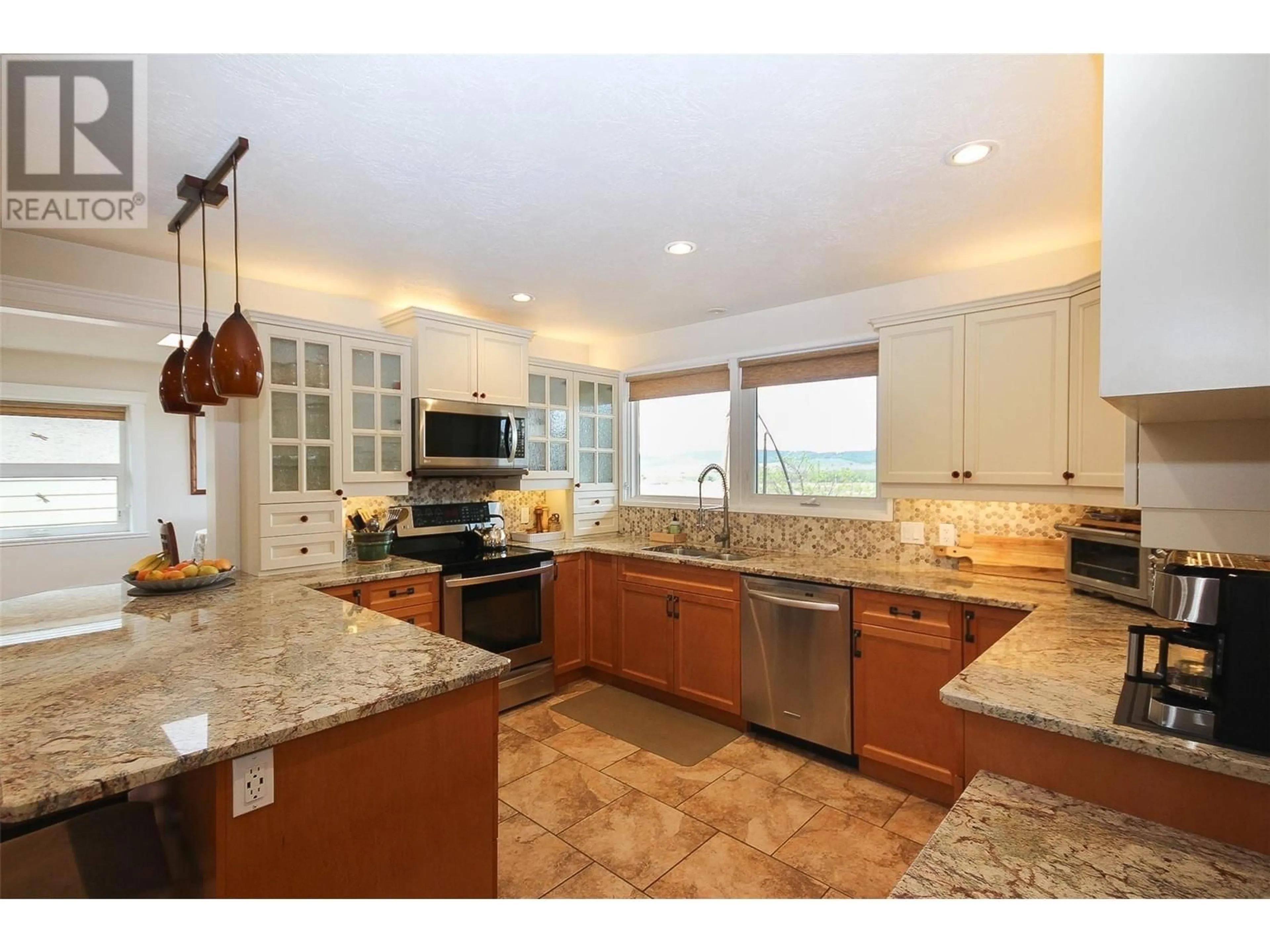 Open concept kitchen, ceramic/tile floor for 1917 93 AVENUE, Dawson Creek British Columbia V1G1E9