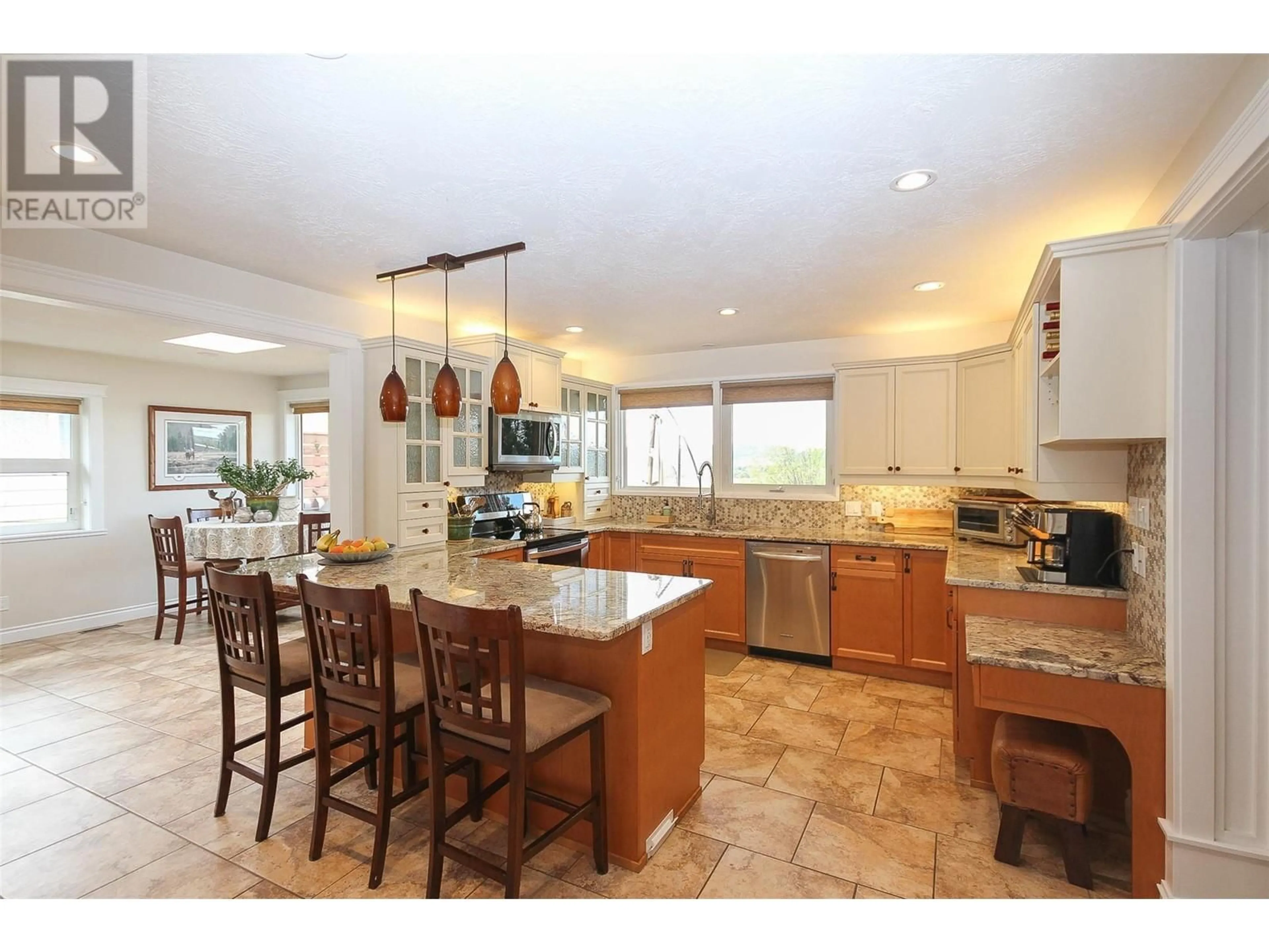 Open concept kitchen, ceramic/tile floor for 1917 93 AVENUE, Dawson Creek British Columbia V1G1E9