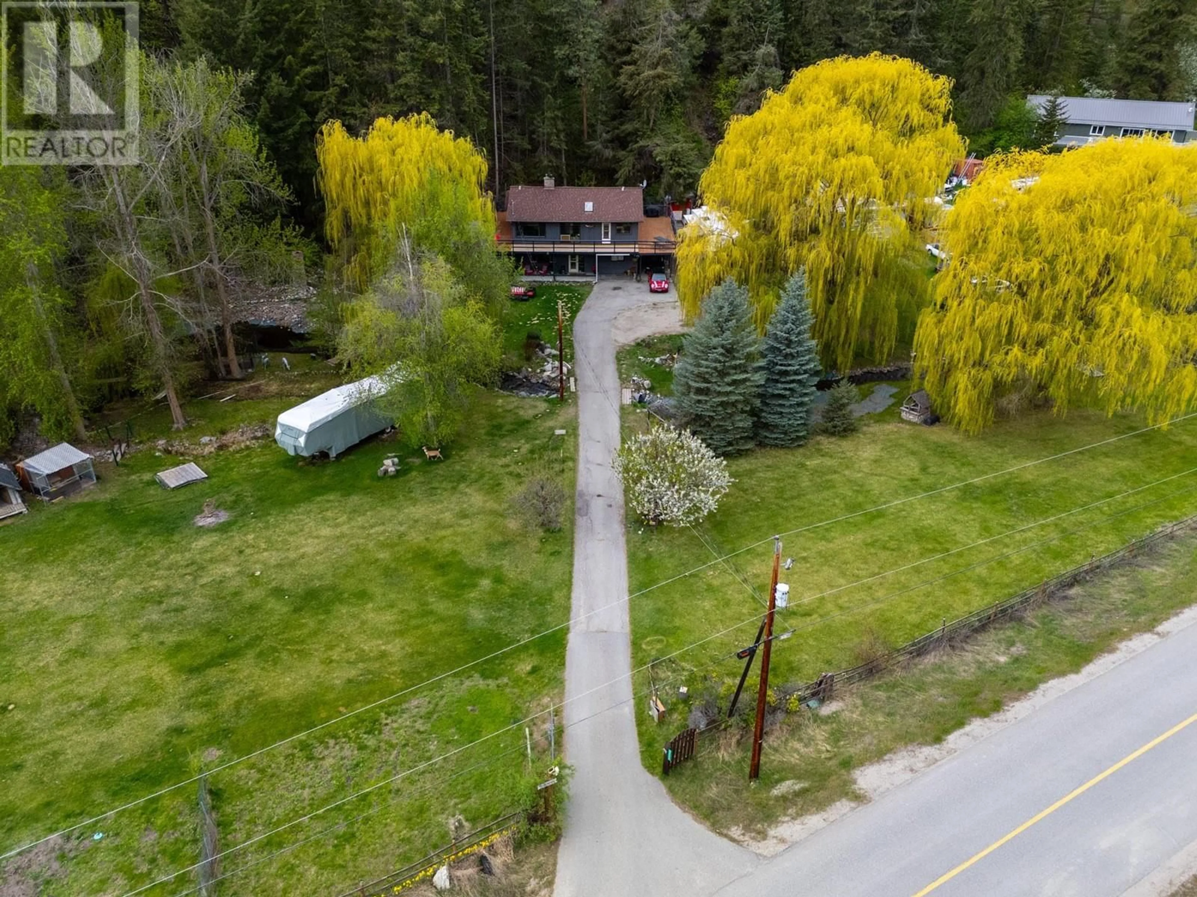 A pic from outside/outdoor area/front of a property/back of a property/a pic from drone, street for 28000 GARNET VALLEY ROAD, Summerland British Columbia V0H1Z3
