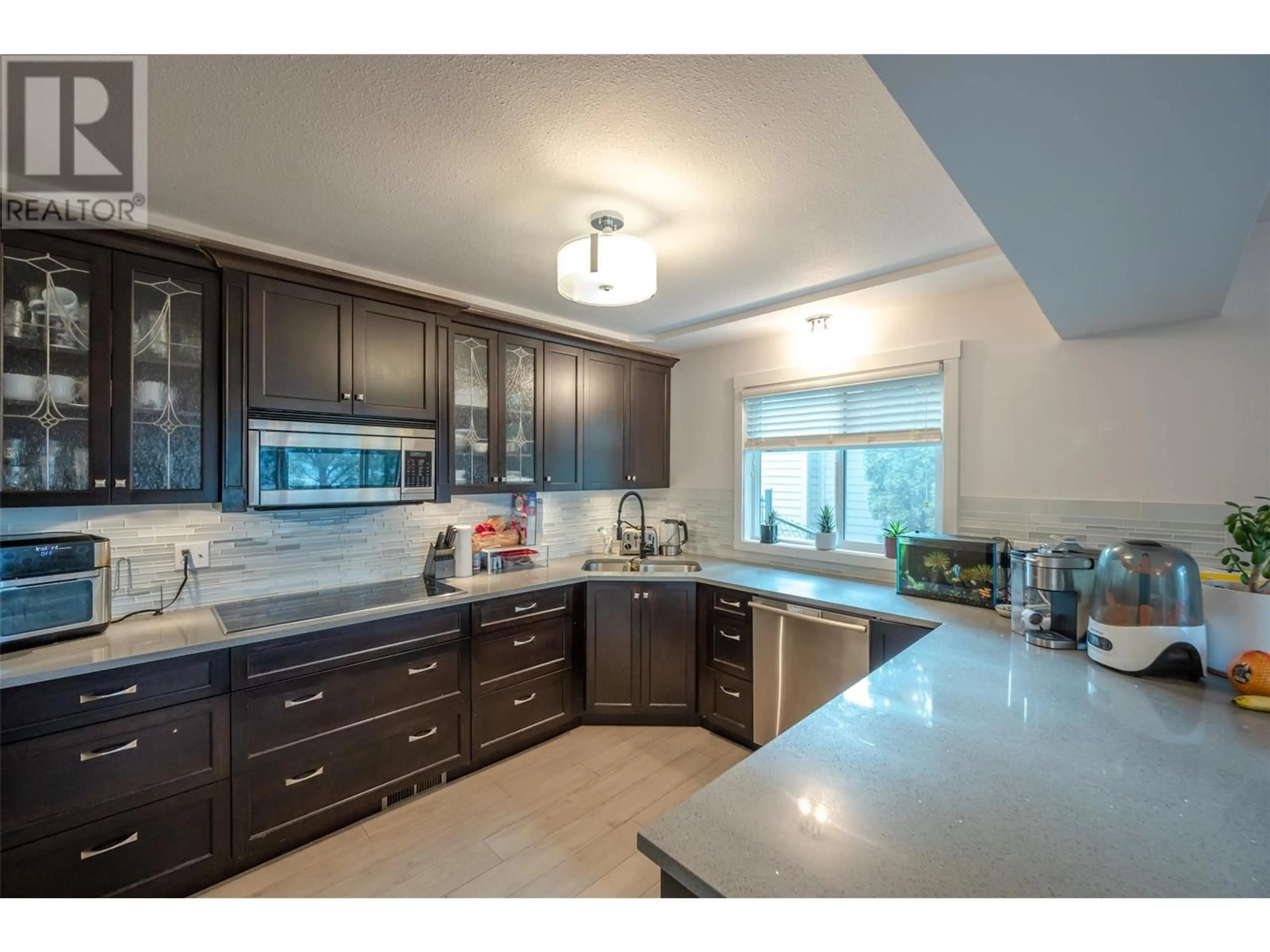 Open concept kitchen, ceramic/tile floor for 138 EVERGREEN CRESCENT, Penticton British Columbia V2A7Y5