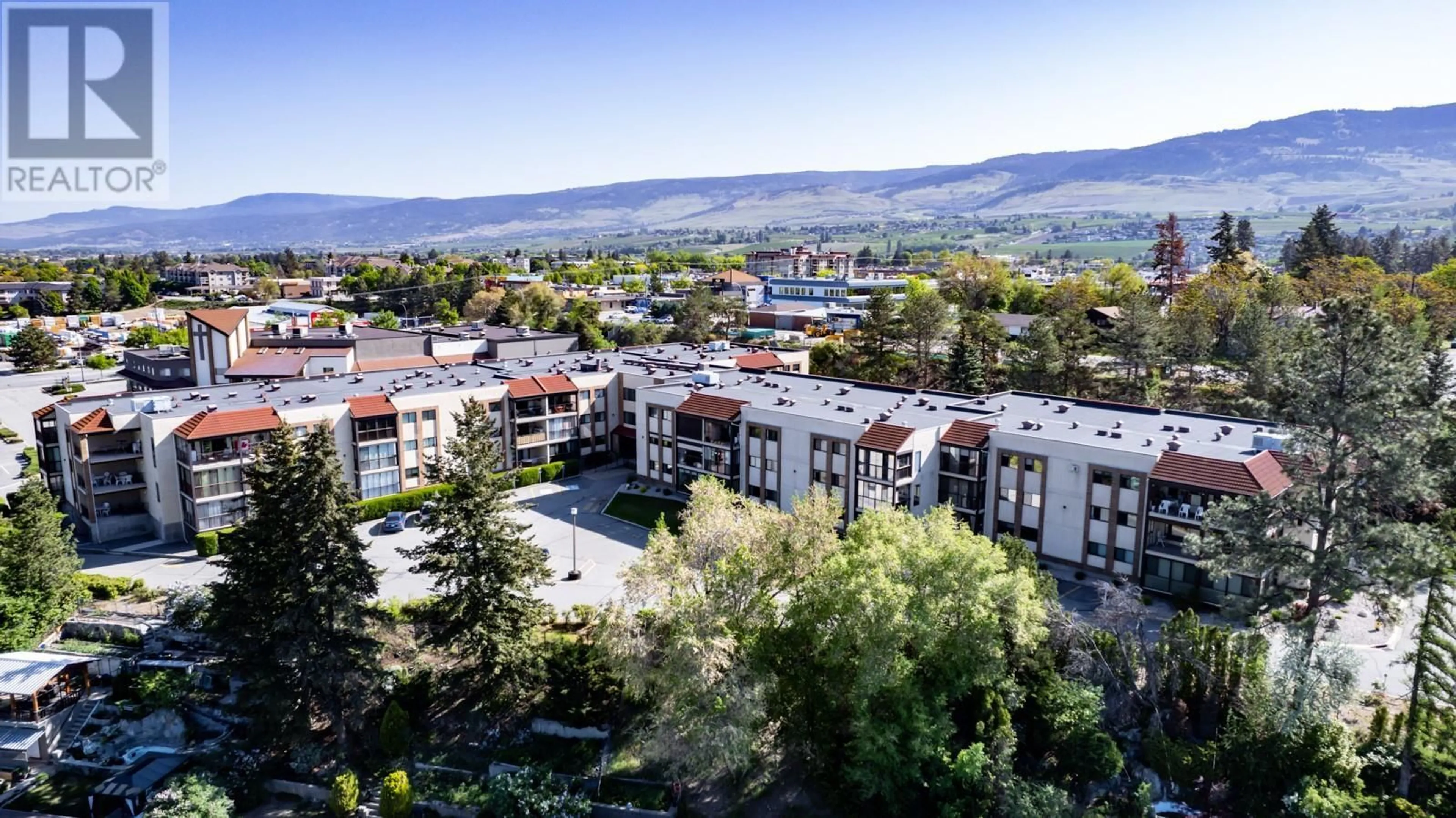 A pic from outside/outdoor area/front of a property/back of a property/a pic from drone, mountain view for 121 - 489 HIGHWAY 33 OTHER EAST, Kelowna British Columbia V1X1Y2