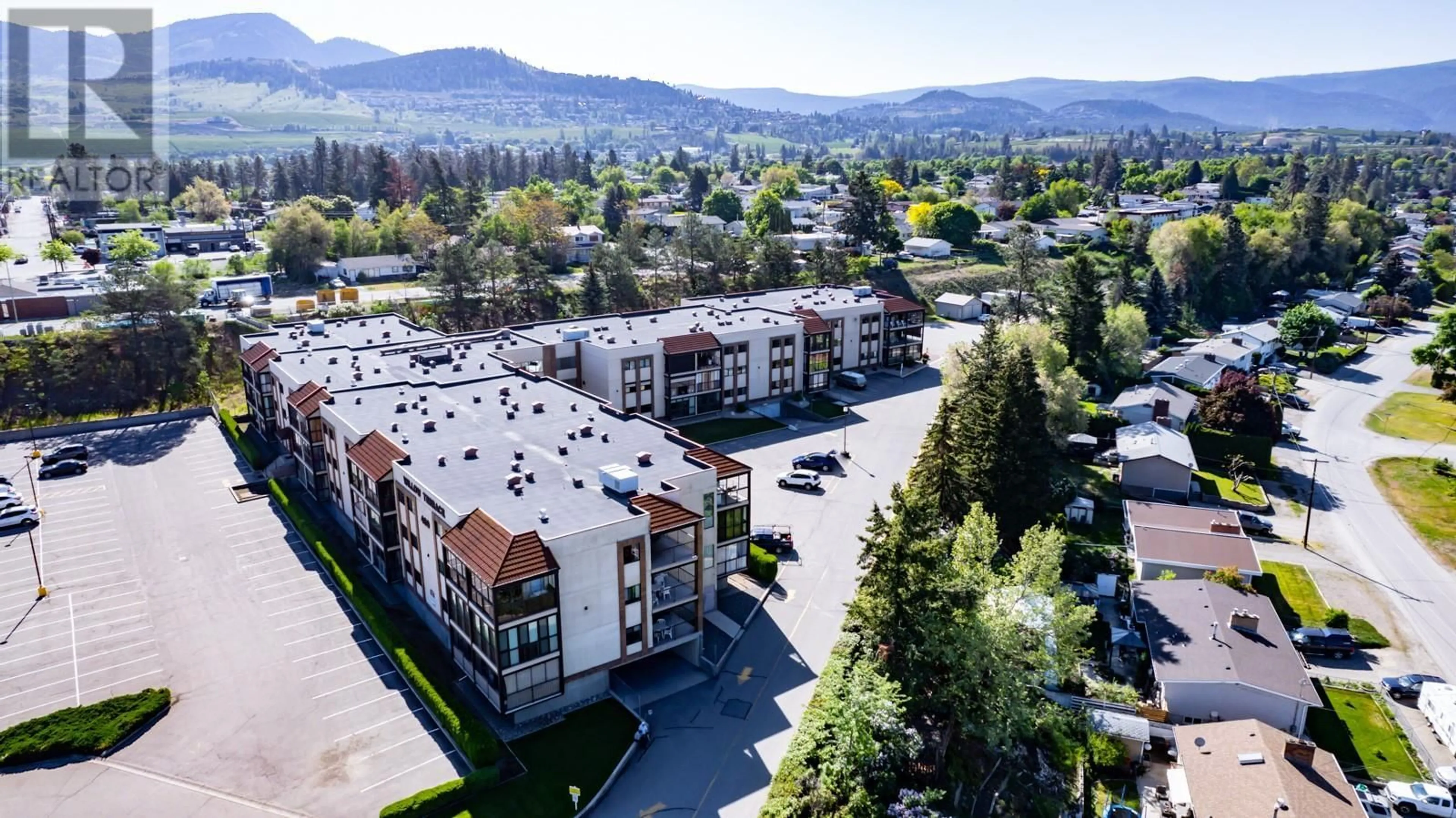 A pic from outside/outdoor area/front of a property/back of a property/a pic from drone, mountain view for 121 - 489 HIGHWAY 33 OTHER EAST, Kelowna British Columbia V1X1Y2