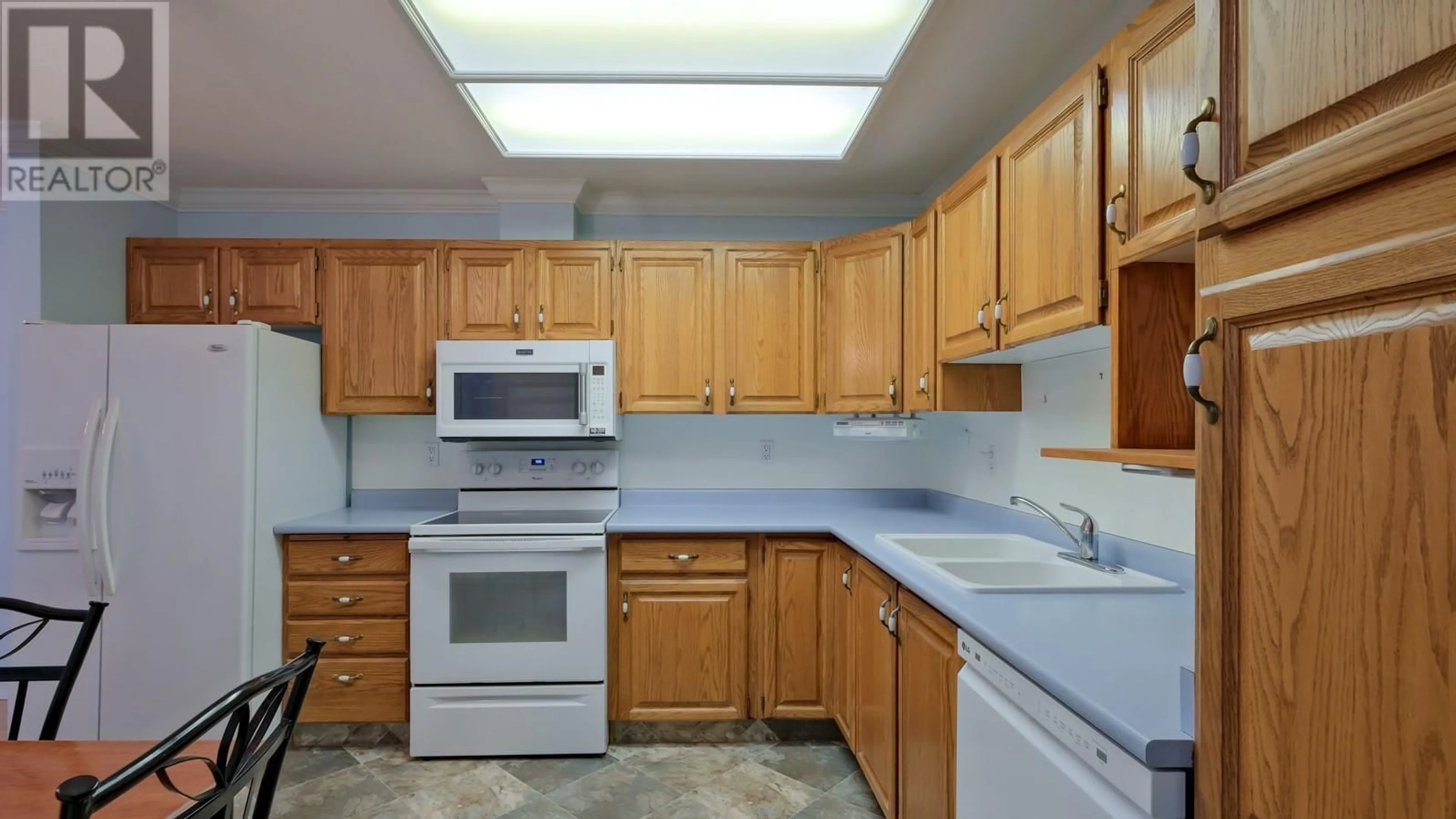Standard kitchen, ceramic/tile floor for 121 - 489 HIGHWAY 33 OTHER EAST, Kelowna British Columbia V1X1Y2