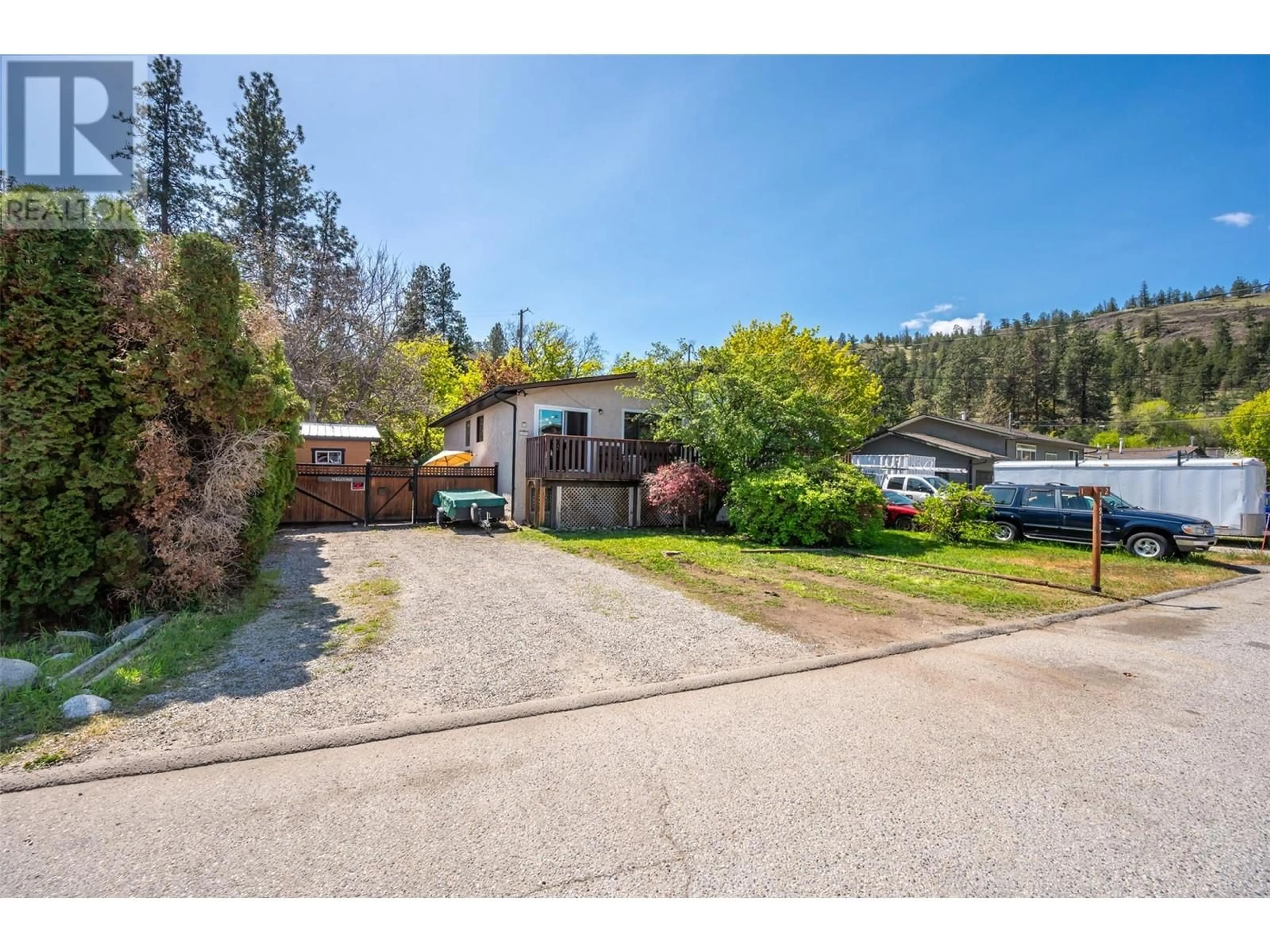 A pic from outside/outdoor area/front of a property/back of a property/a pic from drone, mountain view for 1 - 11911 MARSHALL CRESCENT, Summerland British Columbia V0H1Z5