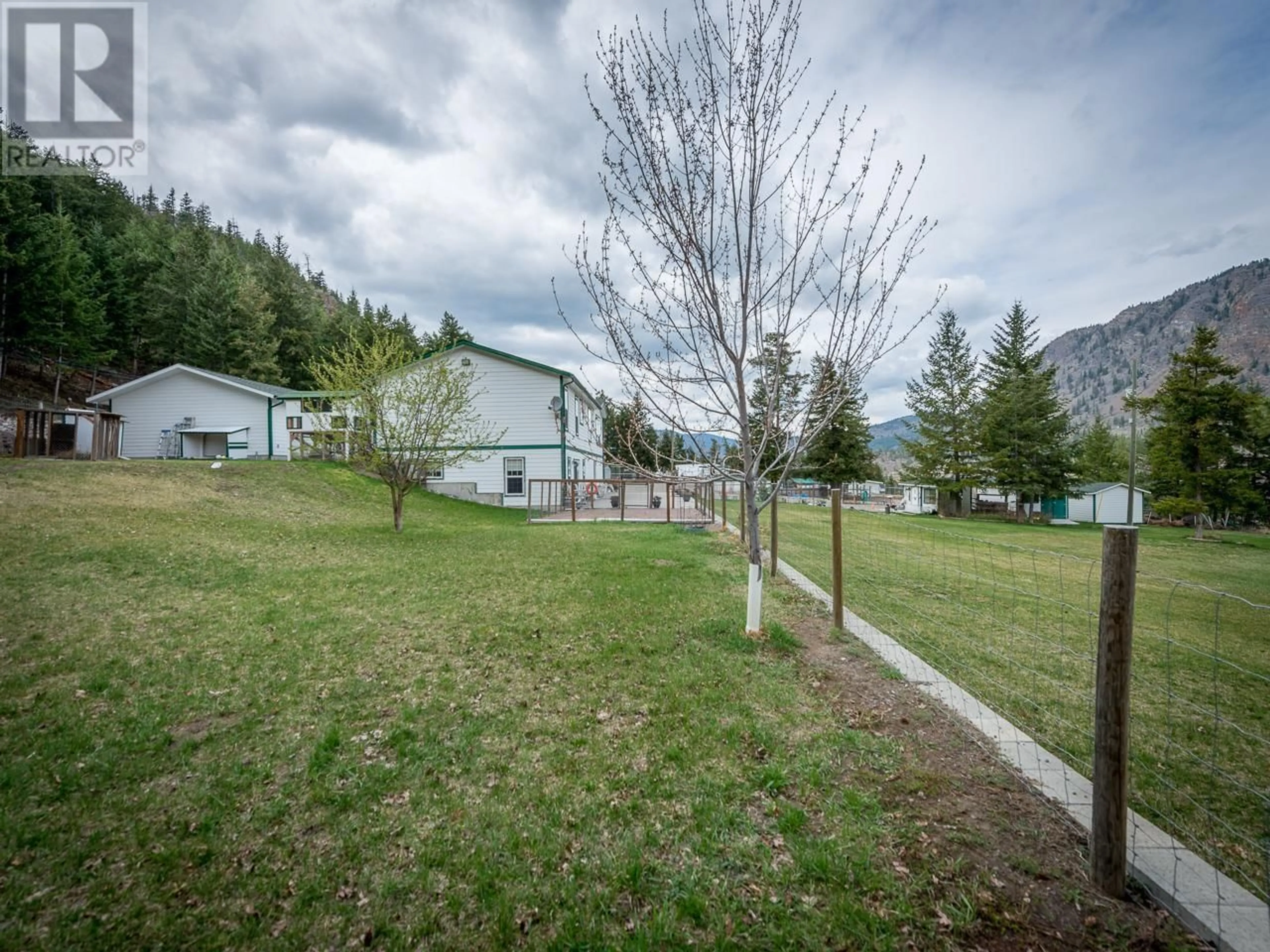 A pic from outside/outdoor area/front of a property/back of a property/a pic from drone, mountain view for 2492 TORGERSON ROAD, Merritt British Columbia V1K1R5