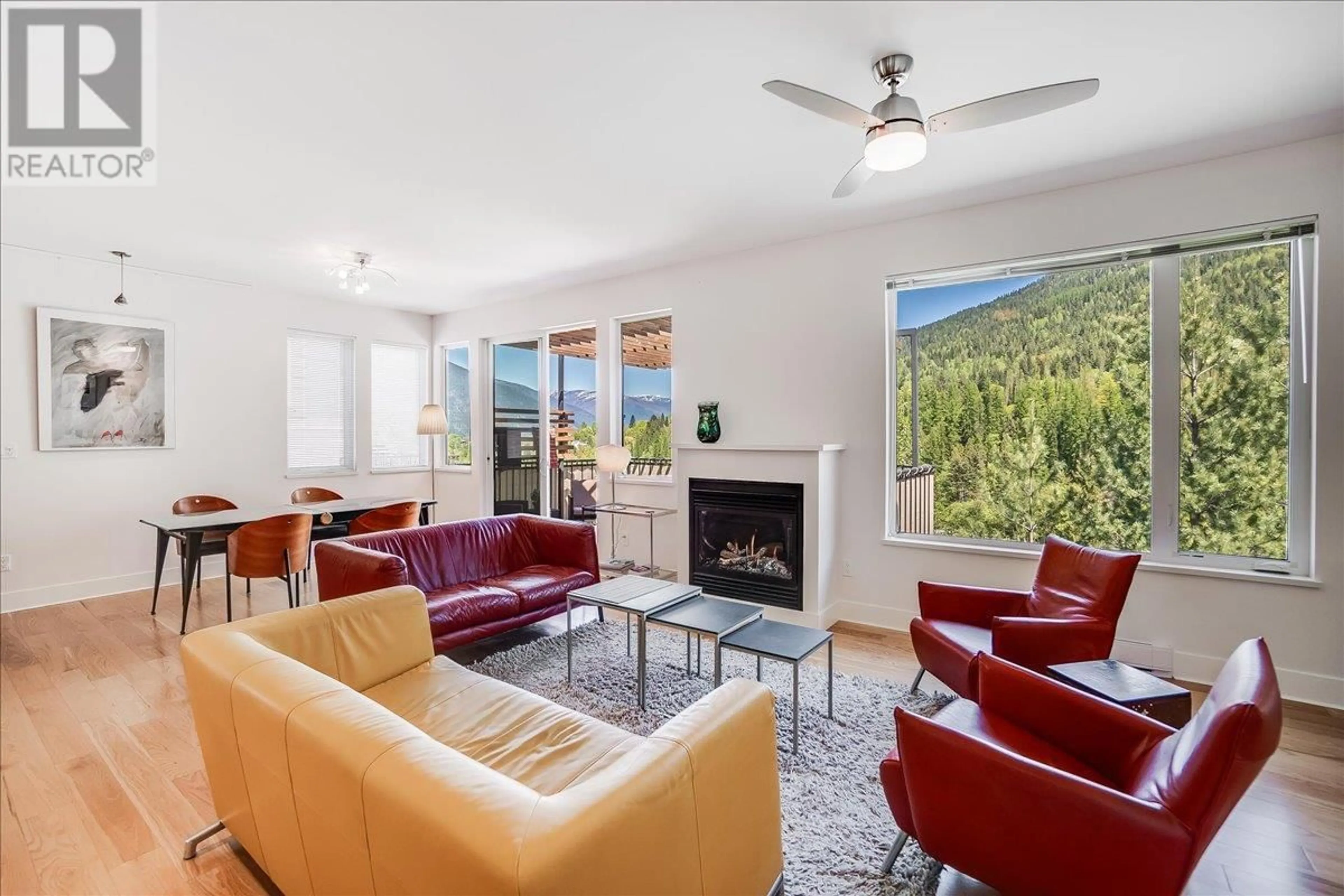 Living room with furniture, ceramic/tile floor for 2430 PERRIER LANE, Nelson British Columbia V1L7C3