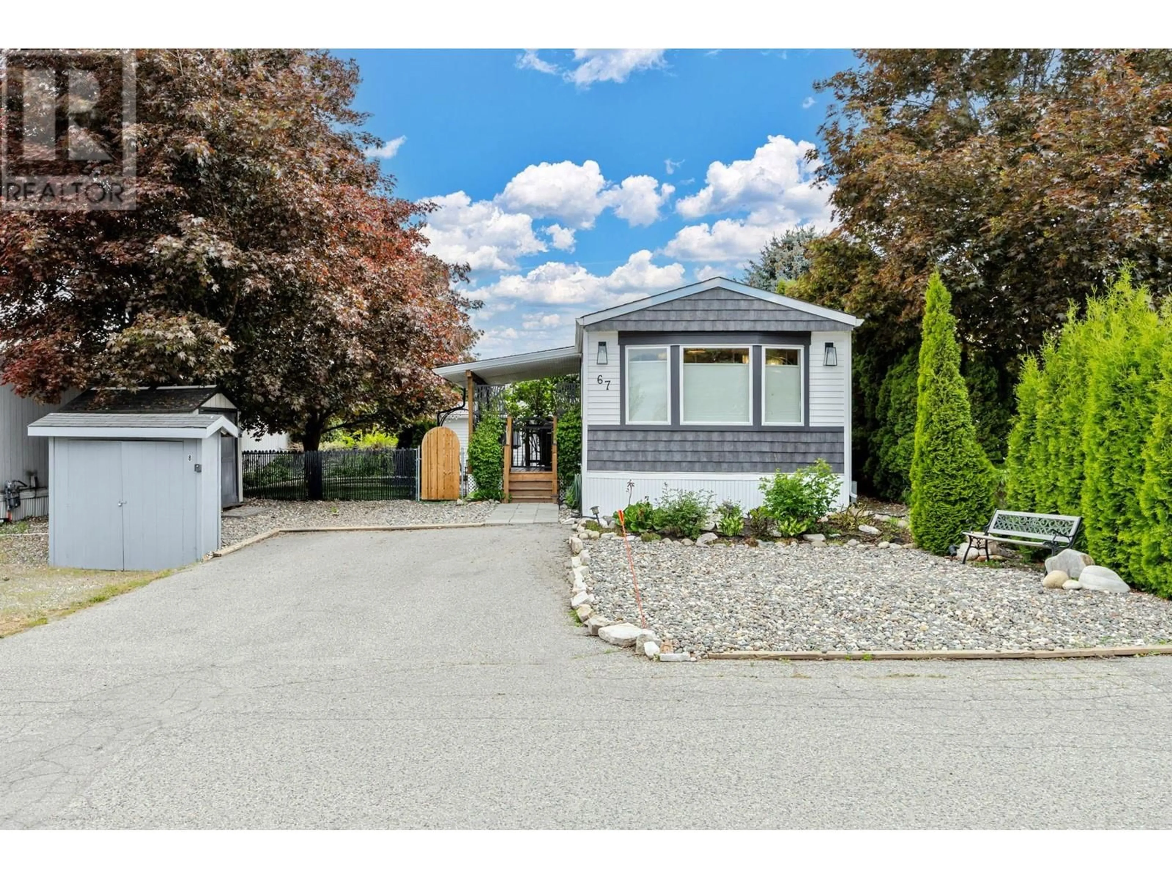 Home with vinyl exterior material, street for 67 - 3381 VILLAGE GREEN WAY, West Kelowna British Columbia V4T2E7