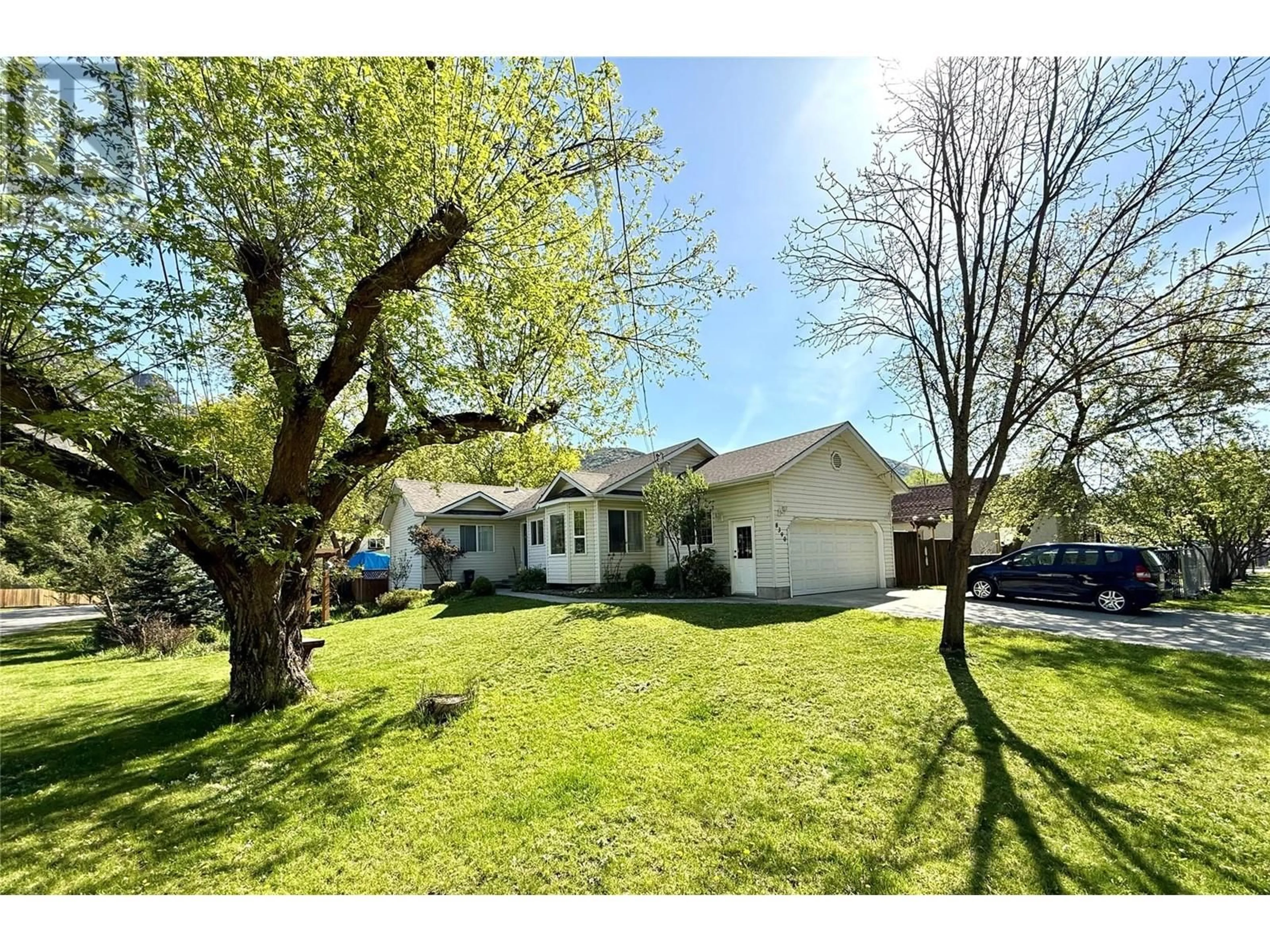 A pic from outside/outdoor area/front of a property/back of a property/a pic from drone, street for 8390 RIVERSIDE DRIVE, Grand Forks British Columbia V0H1H0