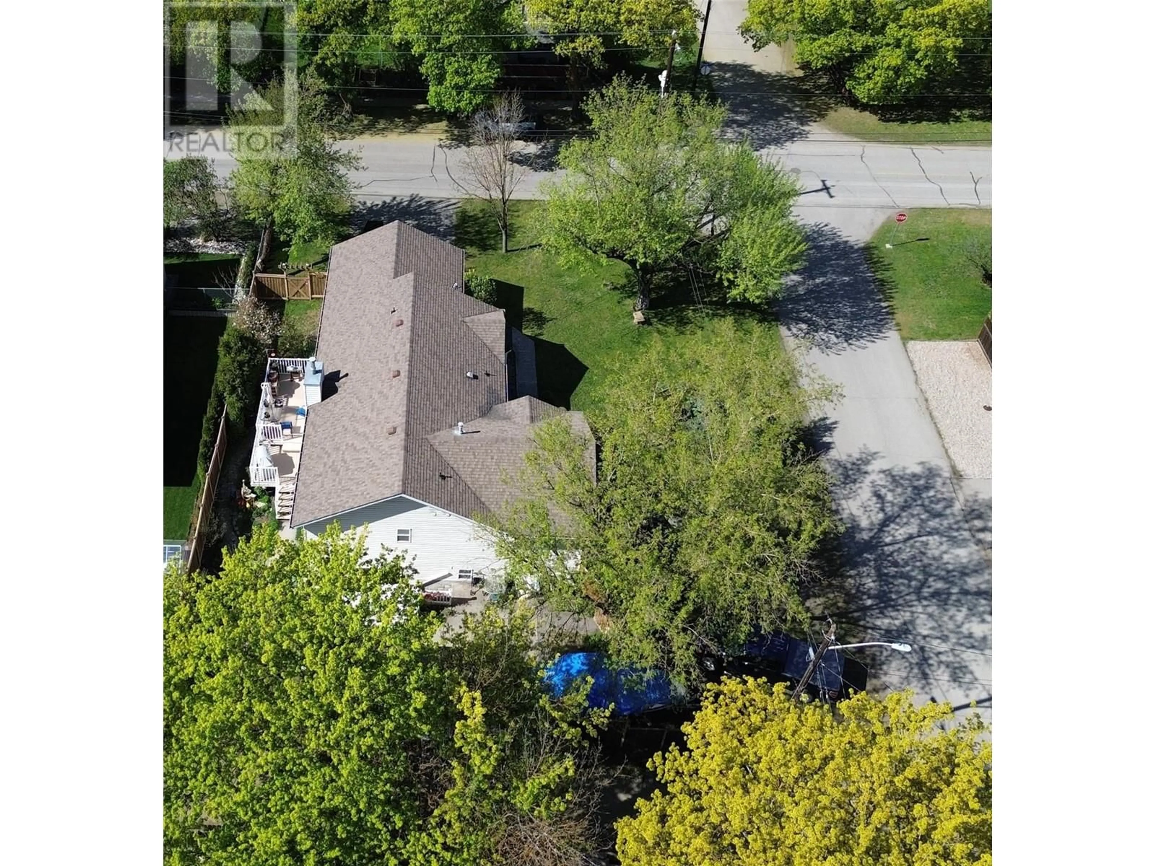 A pic from outside/outdoor area/front of a property/back of a property/a pic from drone, street for 8390 RIVERSIDE DRIVE, Grand Forks British Columbia V0H1H0