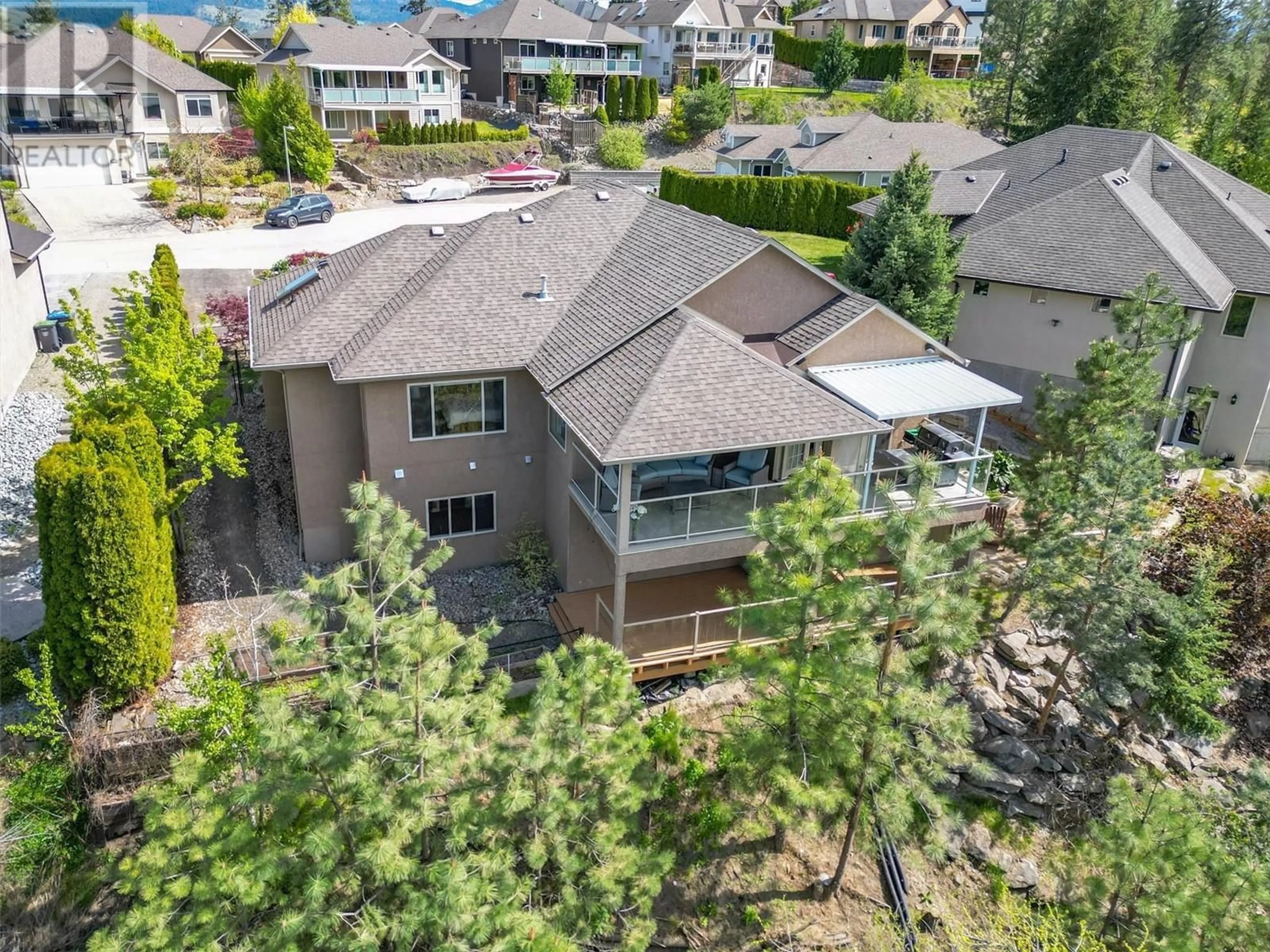 A pic from outside/outdoor area/front of a property/back of a property/a pic from drone, mountain view for 2204 QUAIL RUN DRIVE, Kelowna British Columbia V1V2S4