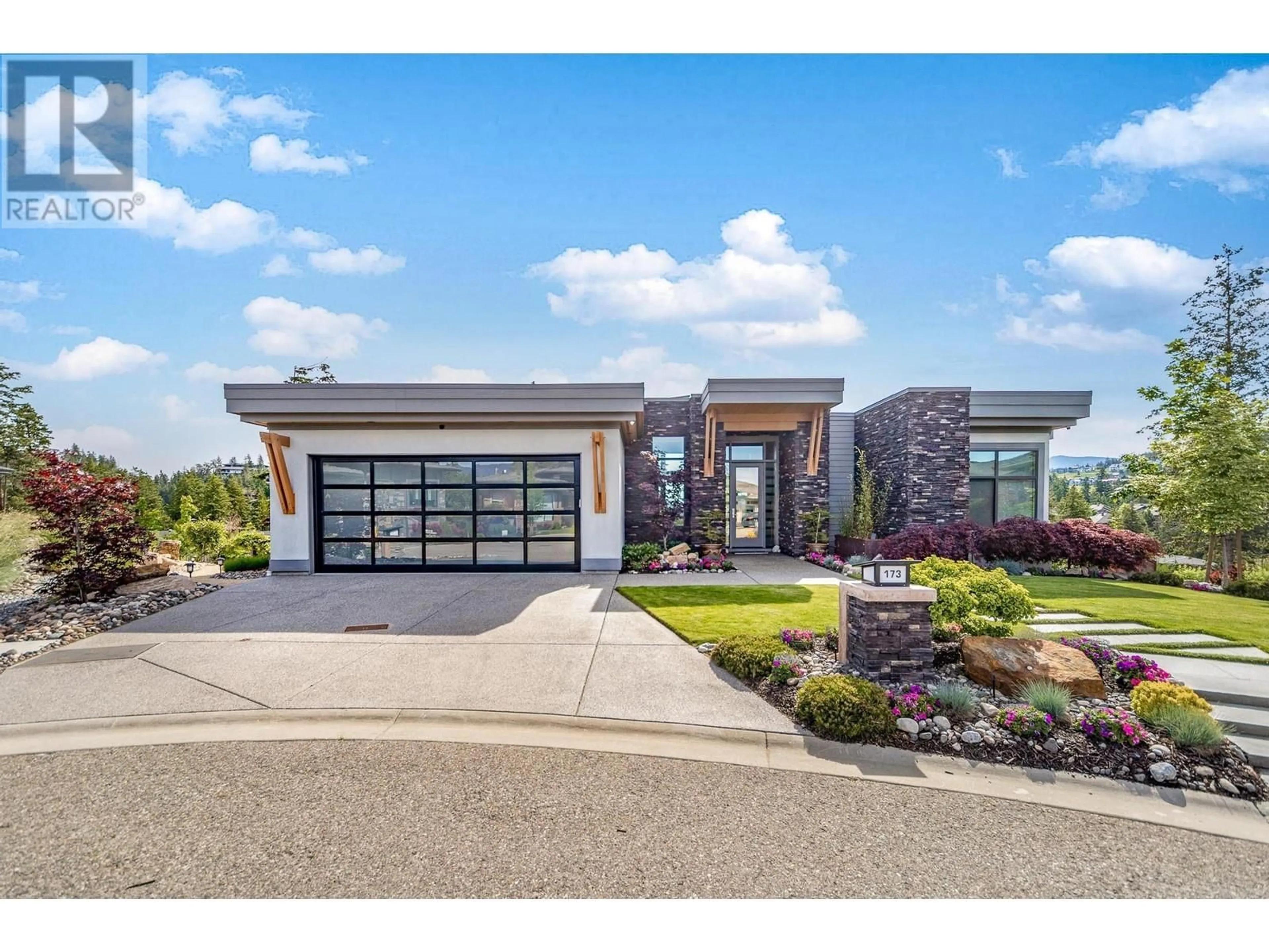Home with brick exterior material, unknown for 173 WHITETAIL RIDGE, Vernon British Columbia V1H2L7