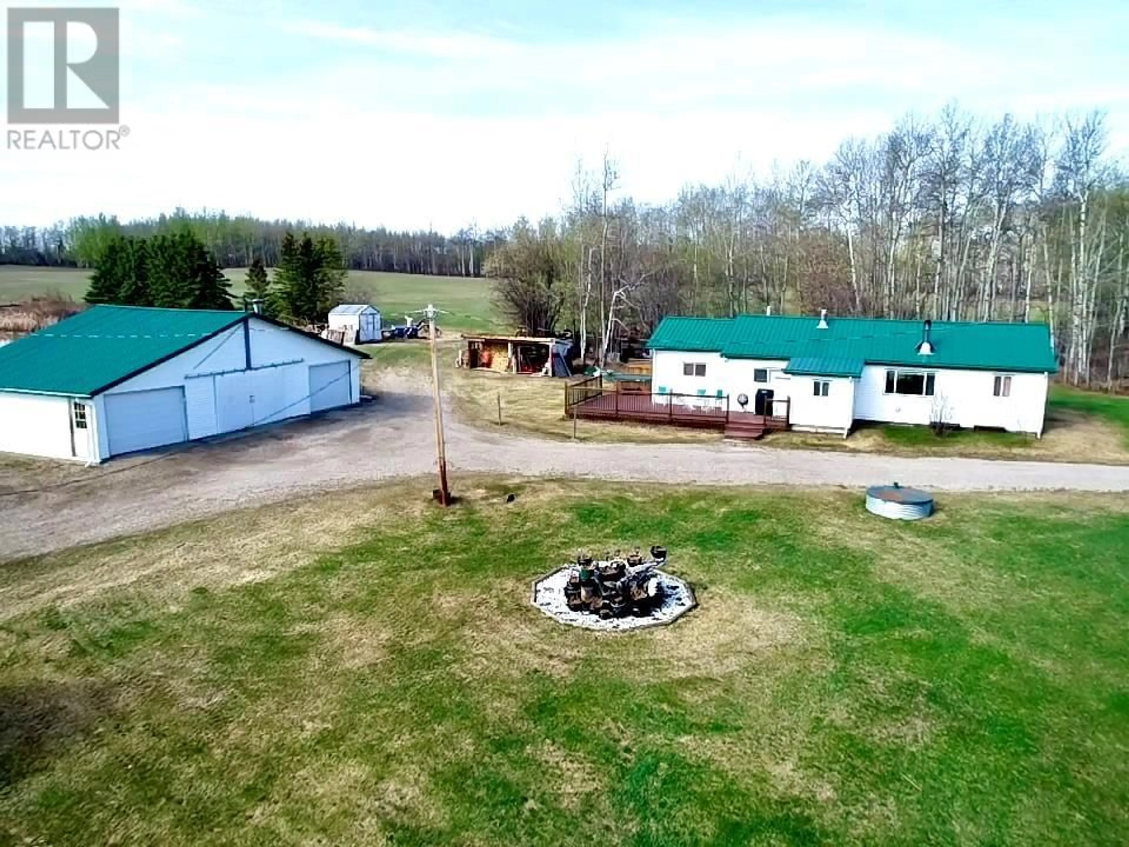 A pic from outside/outdoor area/front of a property/back of a property/a pic from drone, unknown for 3757 212 ROAD, Dawson Creek British Columbia V1G4G3