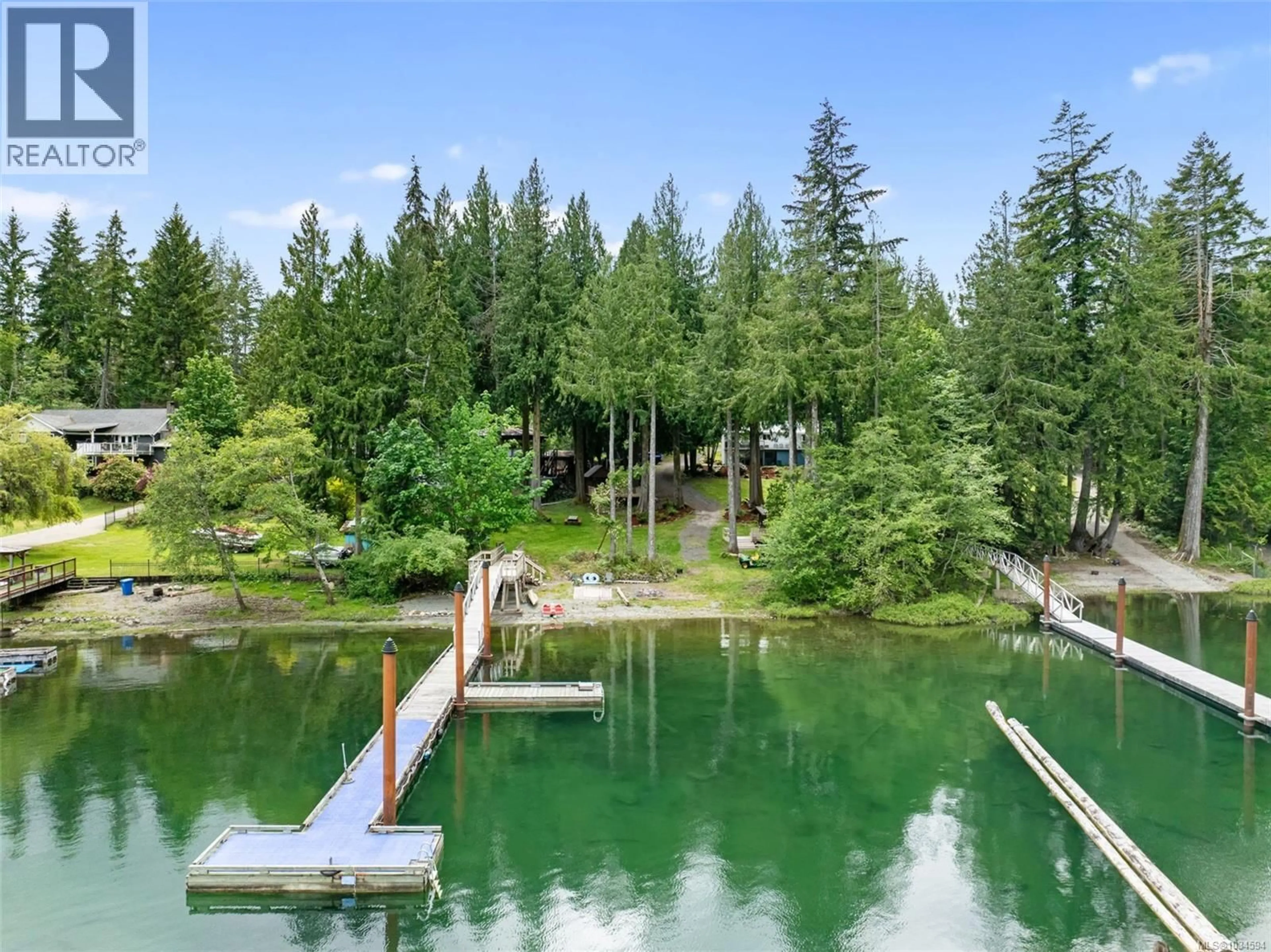A pic from outside/outdoor area/front of a property/back of a property/a pic from drone, water/lake/river/ocean view for 8256 SA-SEEN-OS CRESCENT, Youbou British Columbia V0R3E1