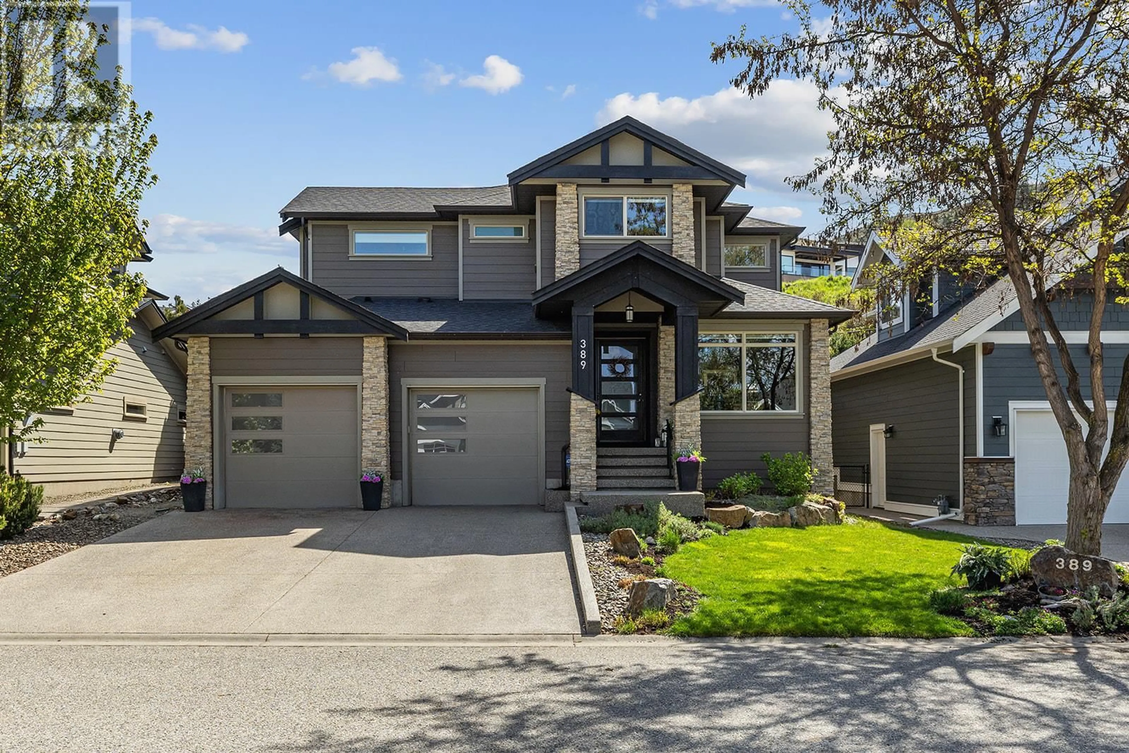 Home with vinyl exterior material, street for 389 RINDLE COURT, Kelowna British Columbia V1W5G5