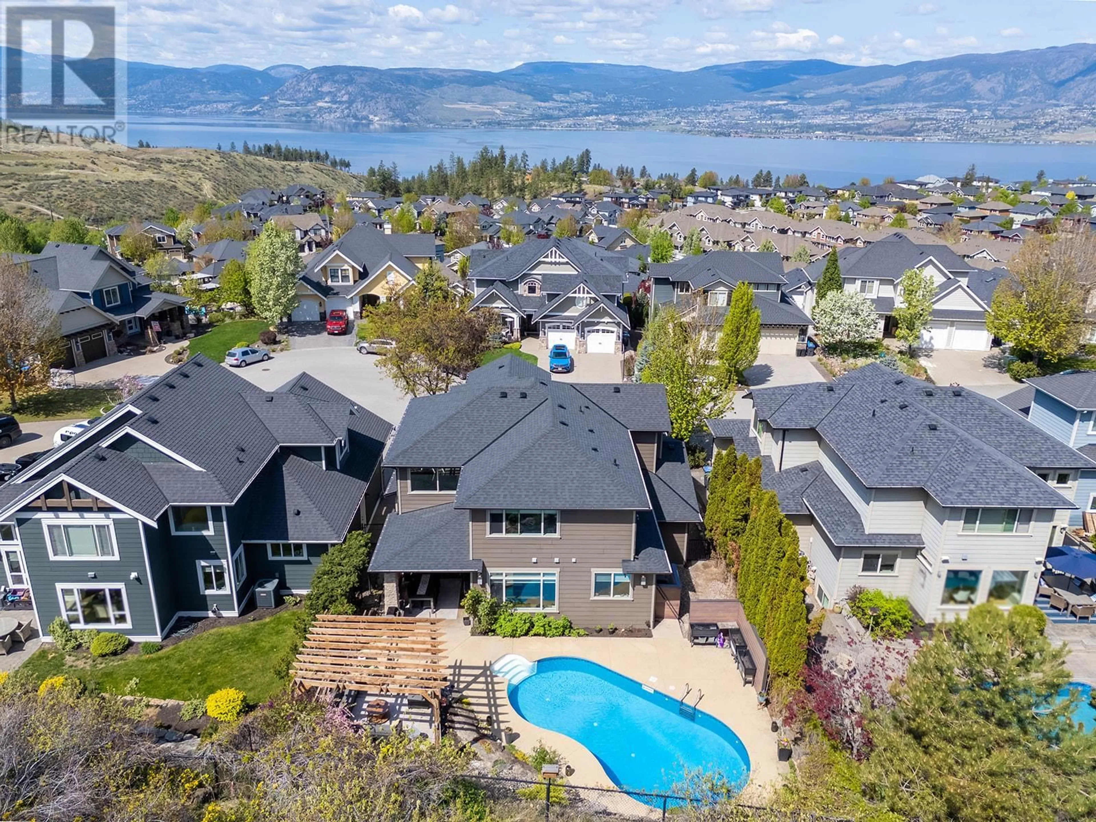 A pic from outside/outdoor area/front of a property/back of a property/a pic from drone, water/lake/river/ocean view for 389 RINDLE COURT, Kelowna British Columbia V1W5G5