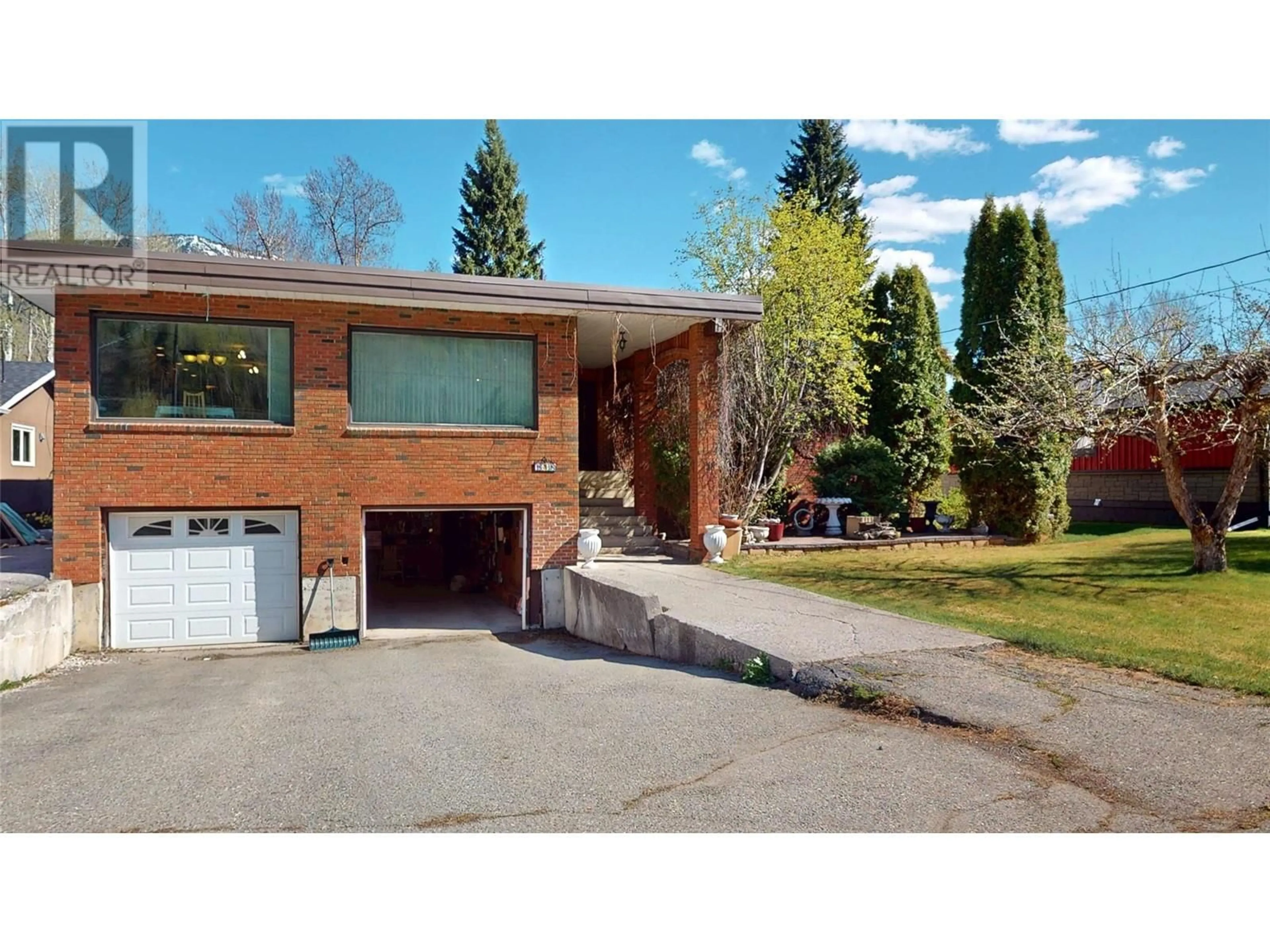 Home with brick exterior material, street for 1698 MCKENZIE ROAD, Fernie British Columbia V0B1M5