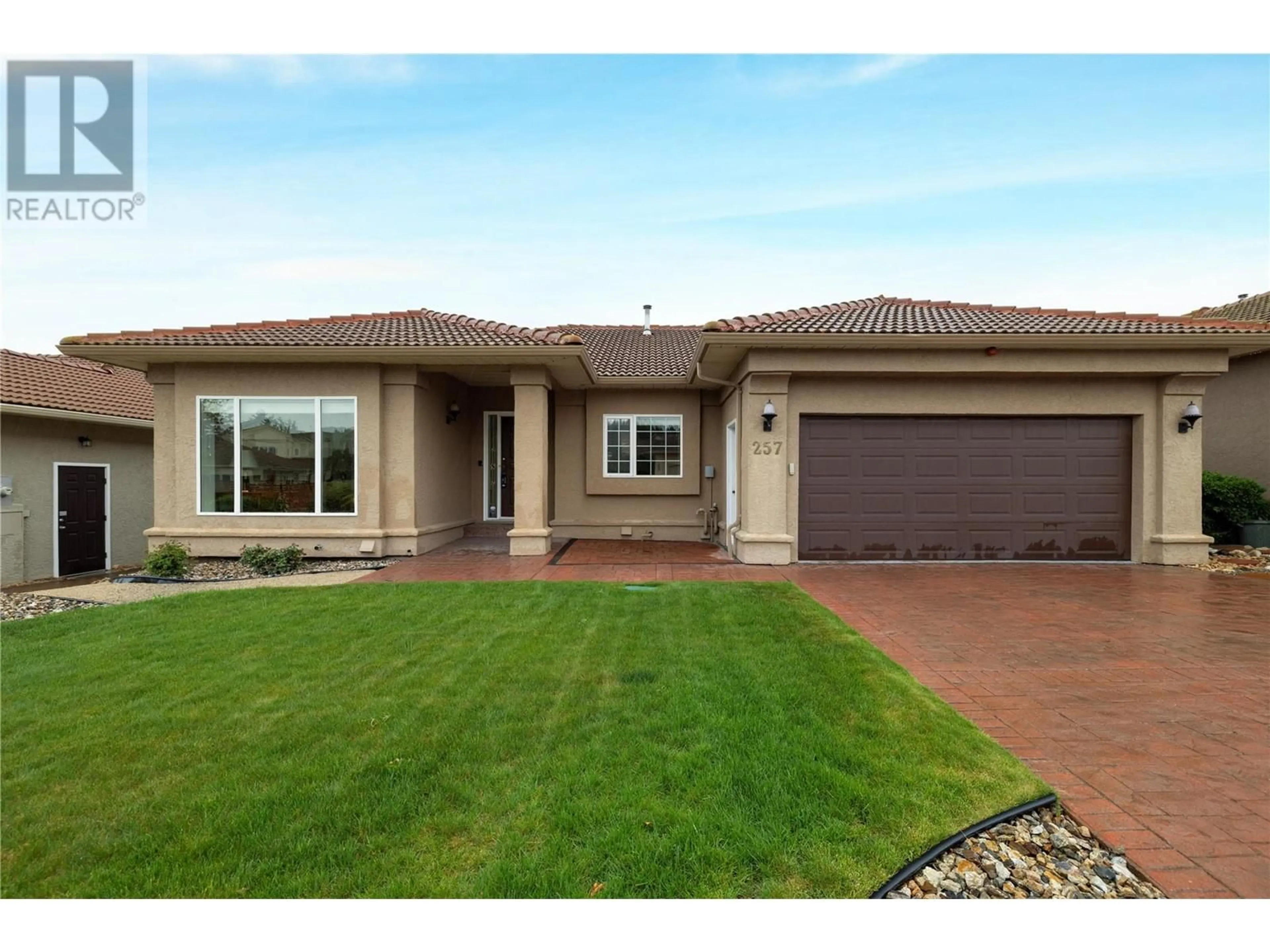 Home with brick exterior material, street for 257 COUNTRY ESTATE DRIVE, Vernon British Columbia V1B2V3