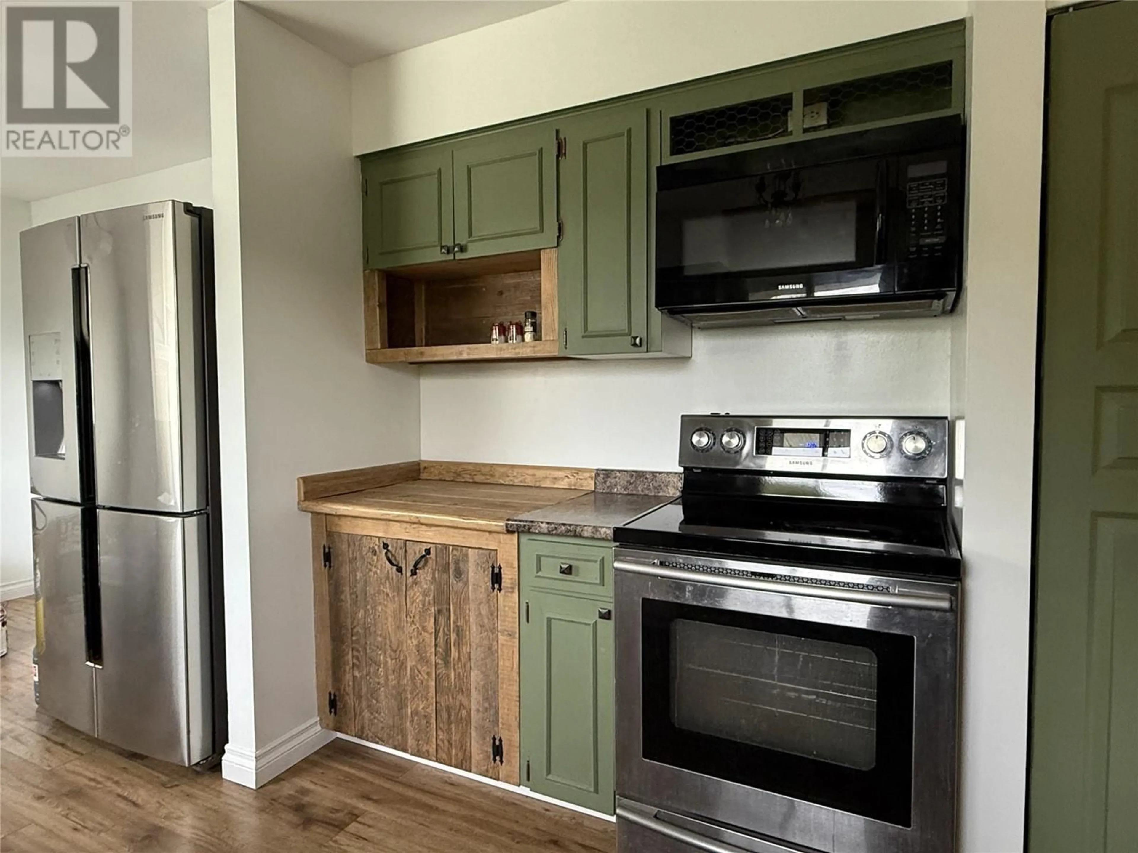 Standard kitchen, wood/laminate floor for 2201 CHAPMAN STREET, Merritt British Columbia V1K1B8