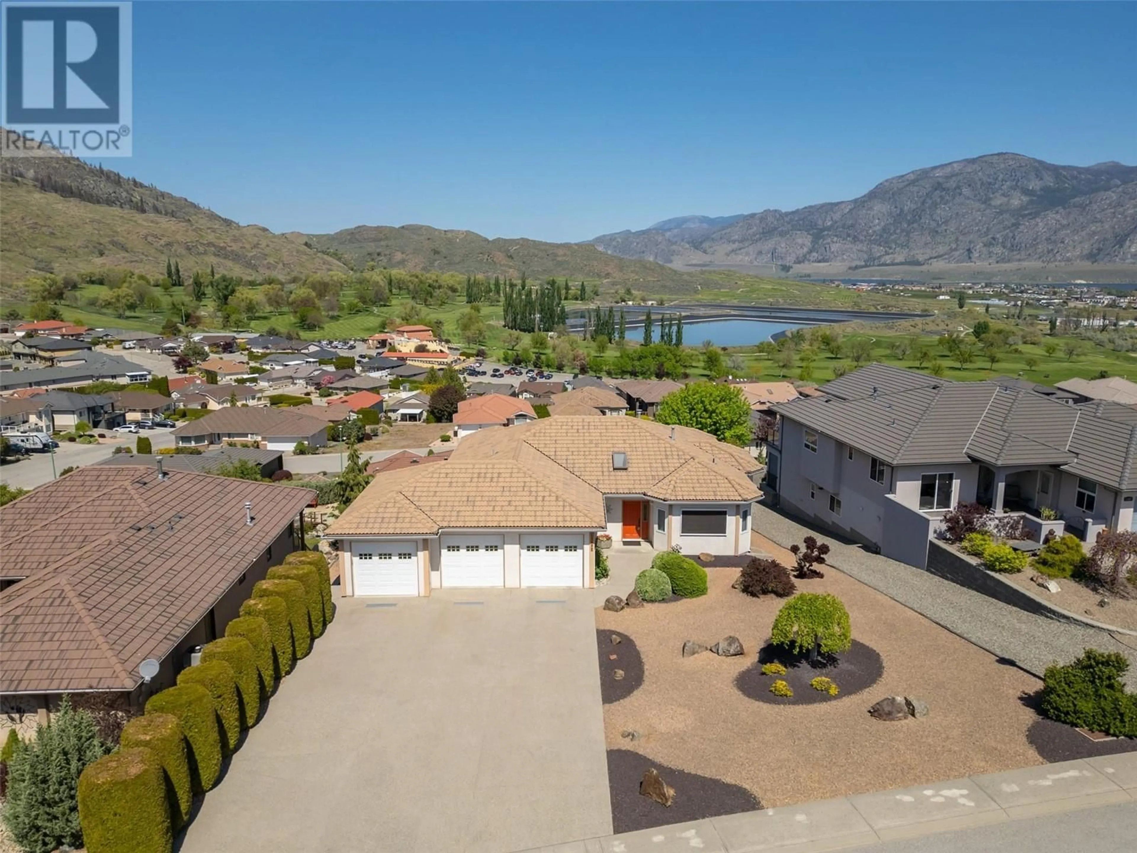 A pic from outside/outdoor area/front of a property/back of a property/a pic from drone, water/lake/river/ocean view for 11909 OLYMPIC VIEW DRIVE, Osoyoos British Columbia V0H1V4