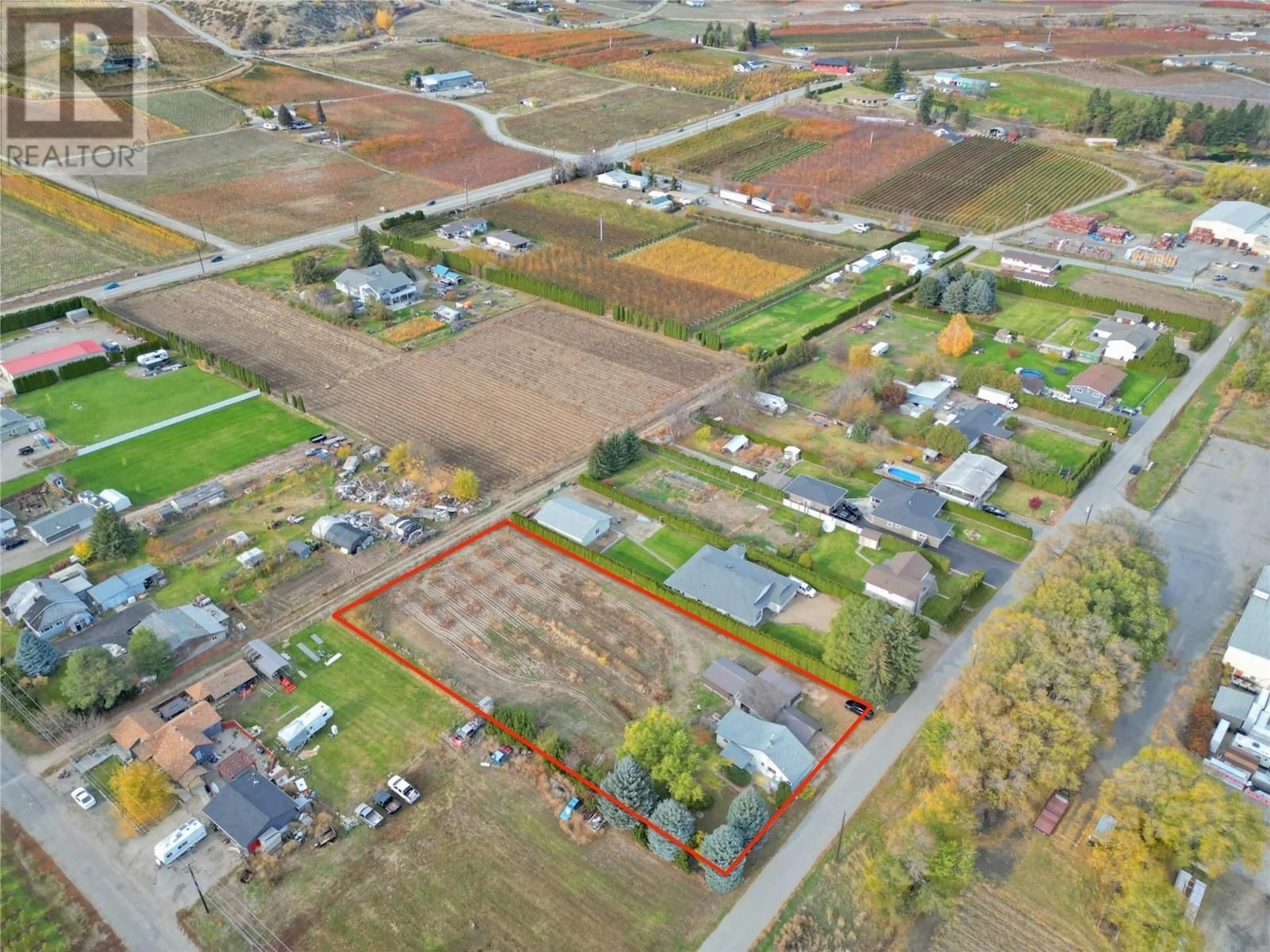 A pic from outside/outdoor area/front of a property/back of a property/a pic from drone, street for 5218 HAYNES ROAD, Oliver British Columbia V0H1T1